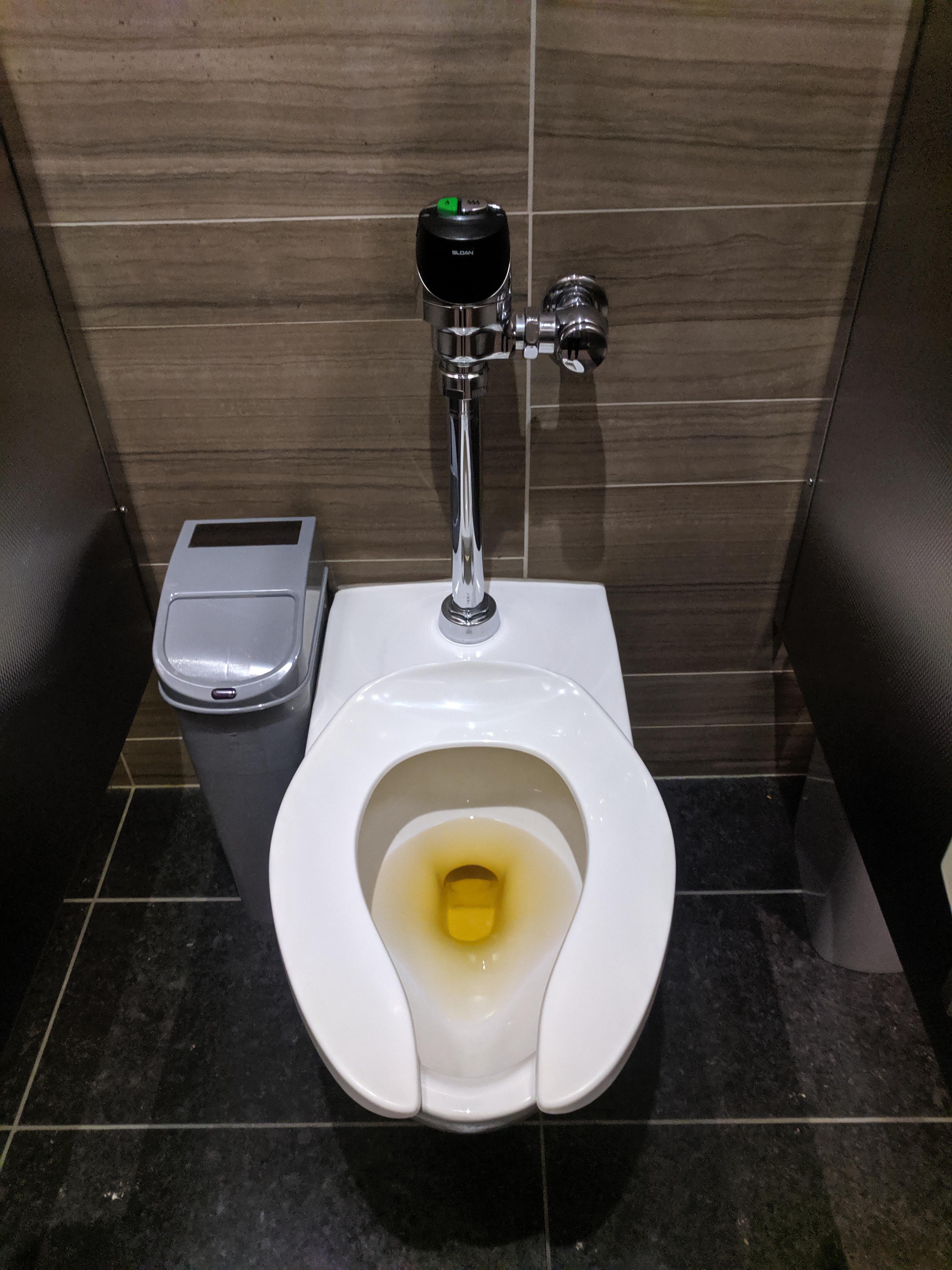 My office's cleaners use a yellow product to sanitize the toilets
