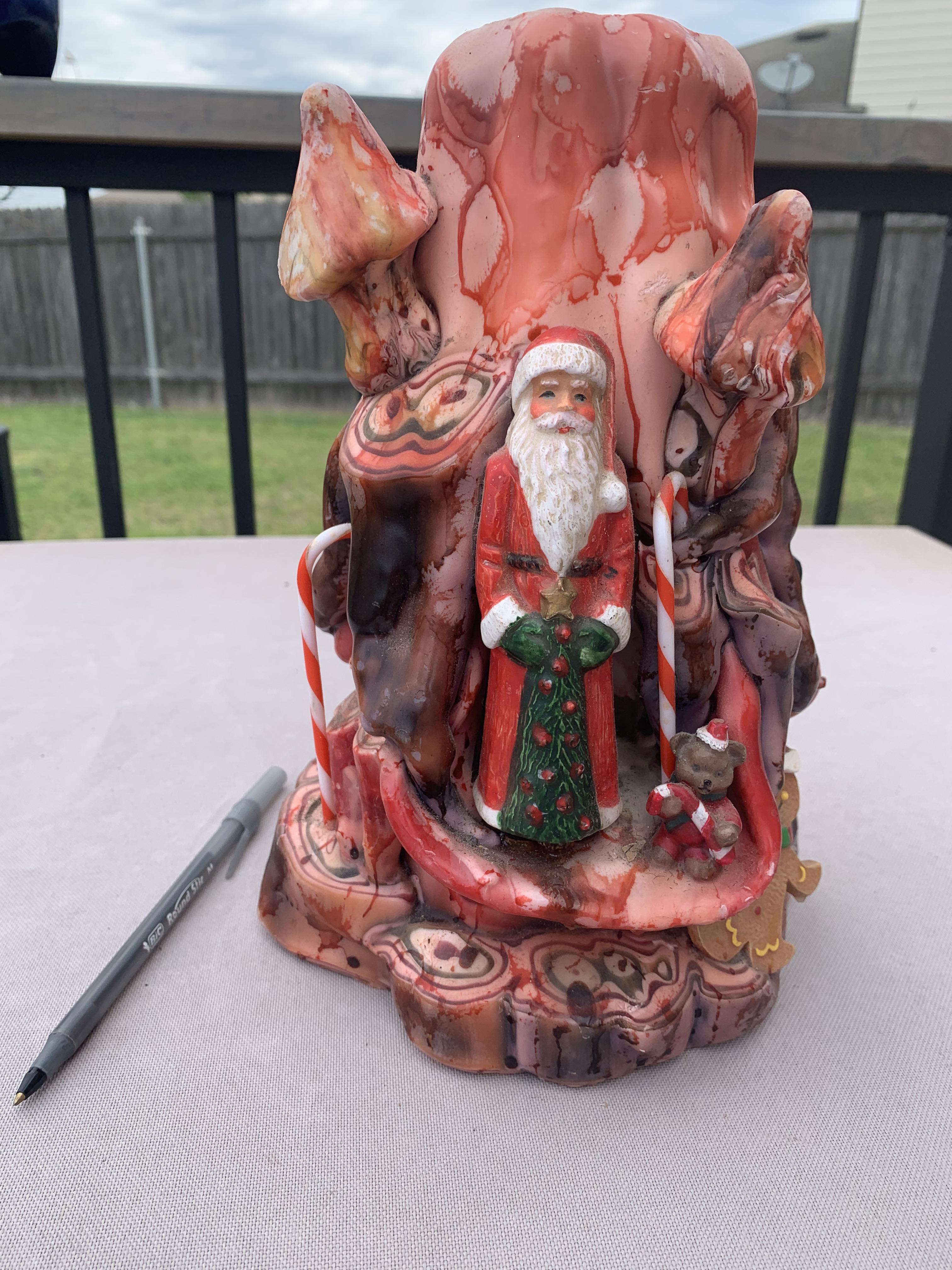 Found this acid trip of a Christmas candle at Goodwill for 3. Pen for scale. The cashier said