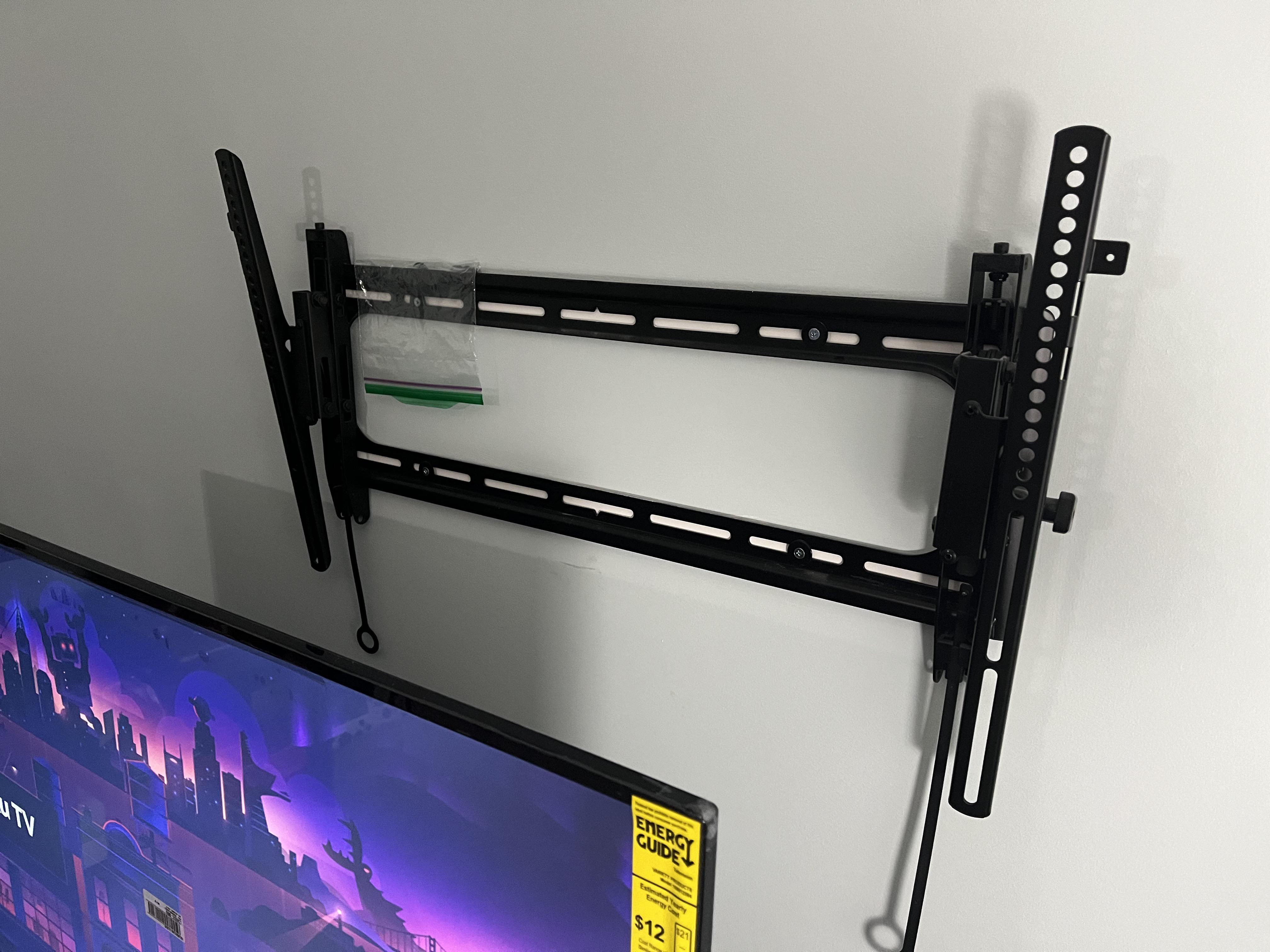 How do I know if this passeddown TV Mount is safe to use? The arms are