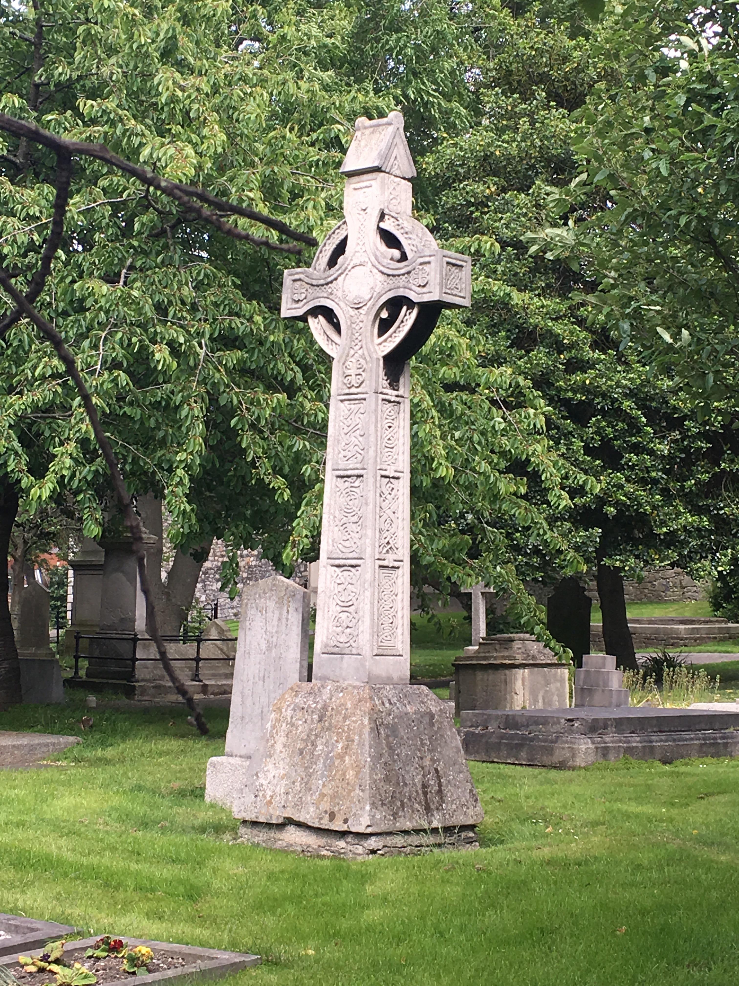 Celtic Cross Tombstone on the Grounds of St. Patrick’s Cathedral in Dublin Ireland. [OC] r