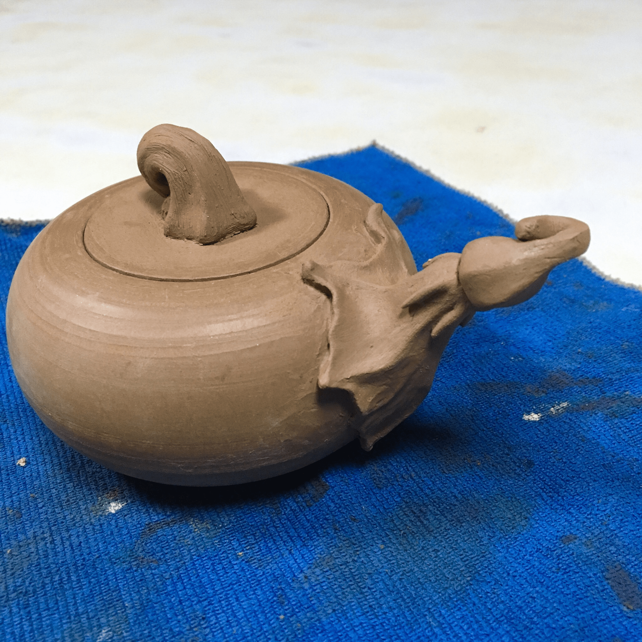 Fall themed teapot with a spout stopper in progress. I’m quite tickled with how it’s coming