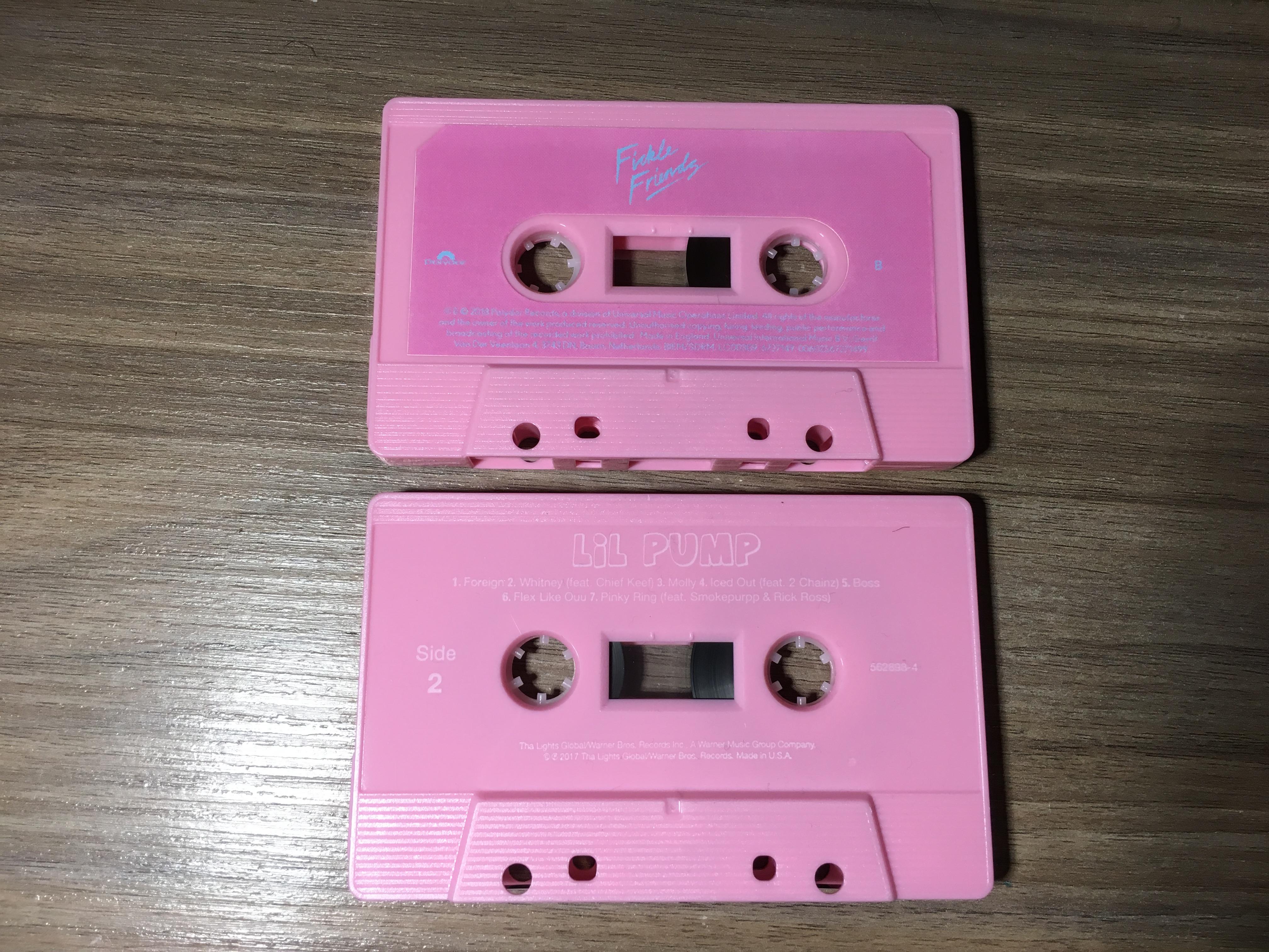 These two recent albums released on cassette tape share the same pink