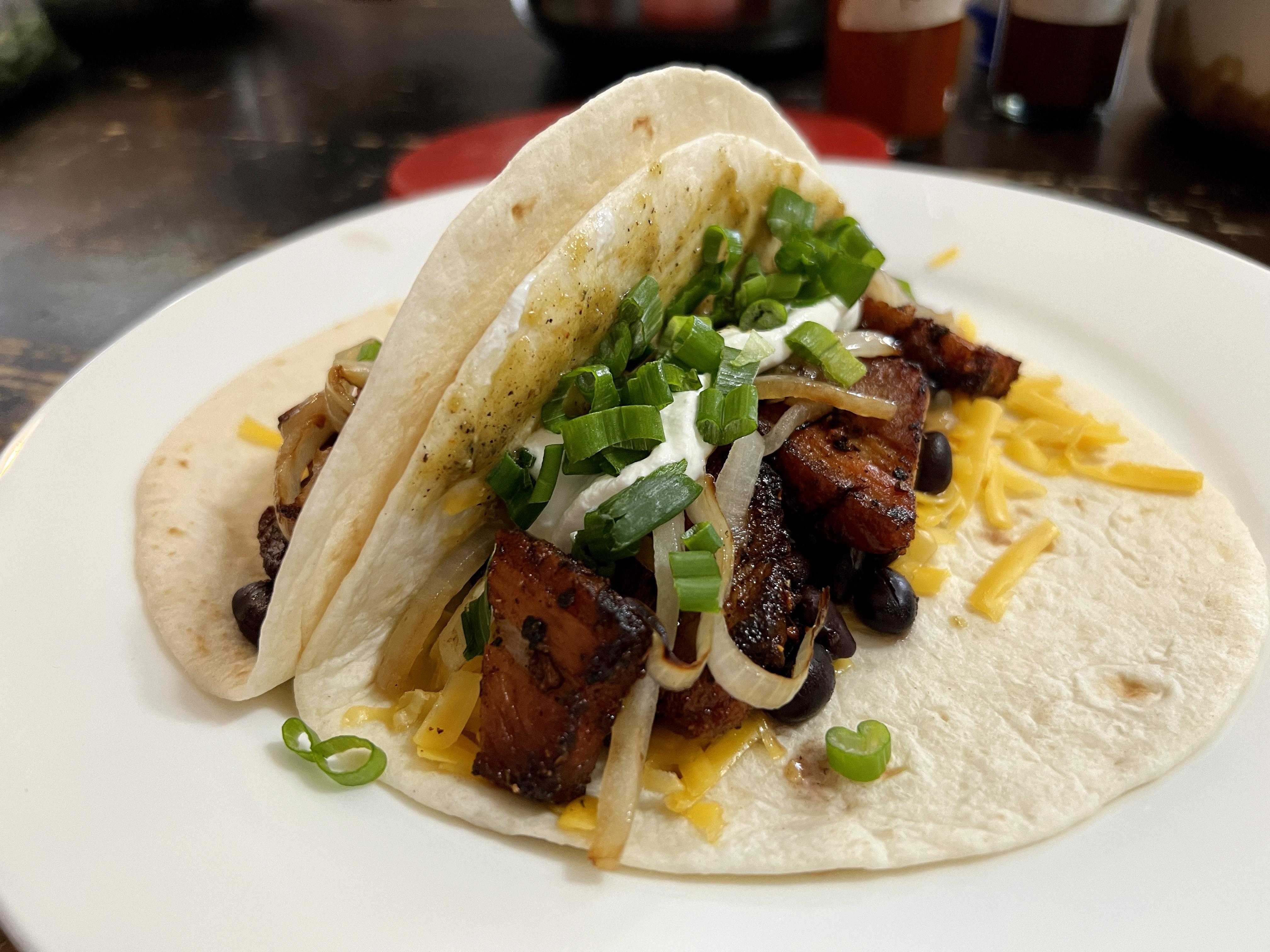 Crispy pork belly fajitas with a homemade fire roasted verde salsa