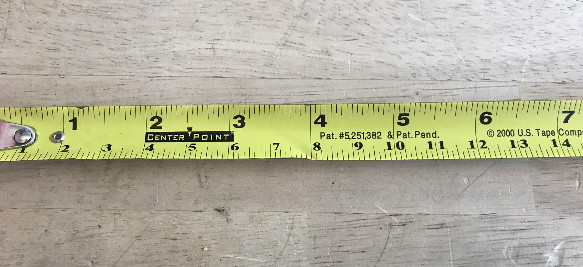 This tape measure is labeled in inches and halfinches r