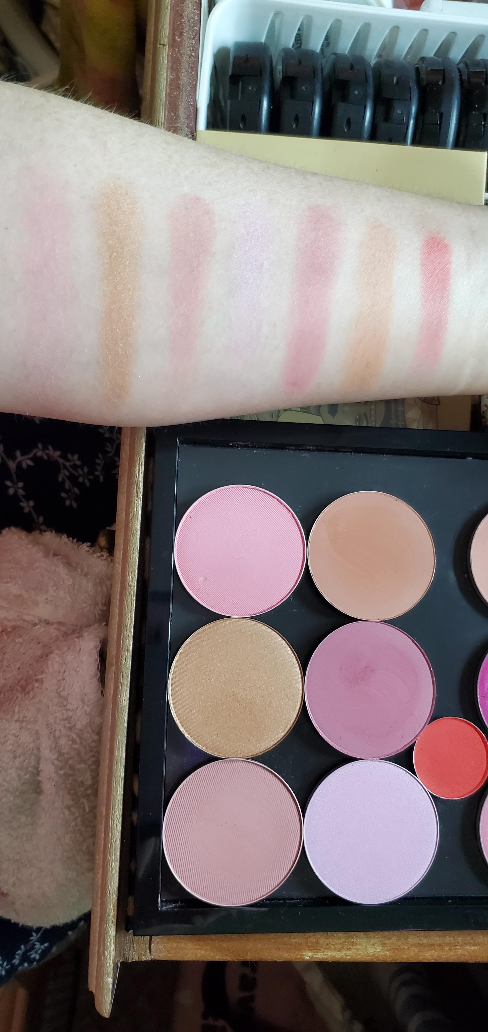 7 of my MAC powder blushes swatched on my bare arm. Finger swatches on