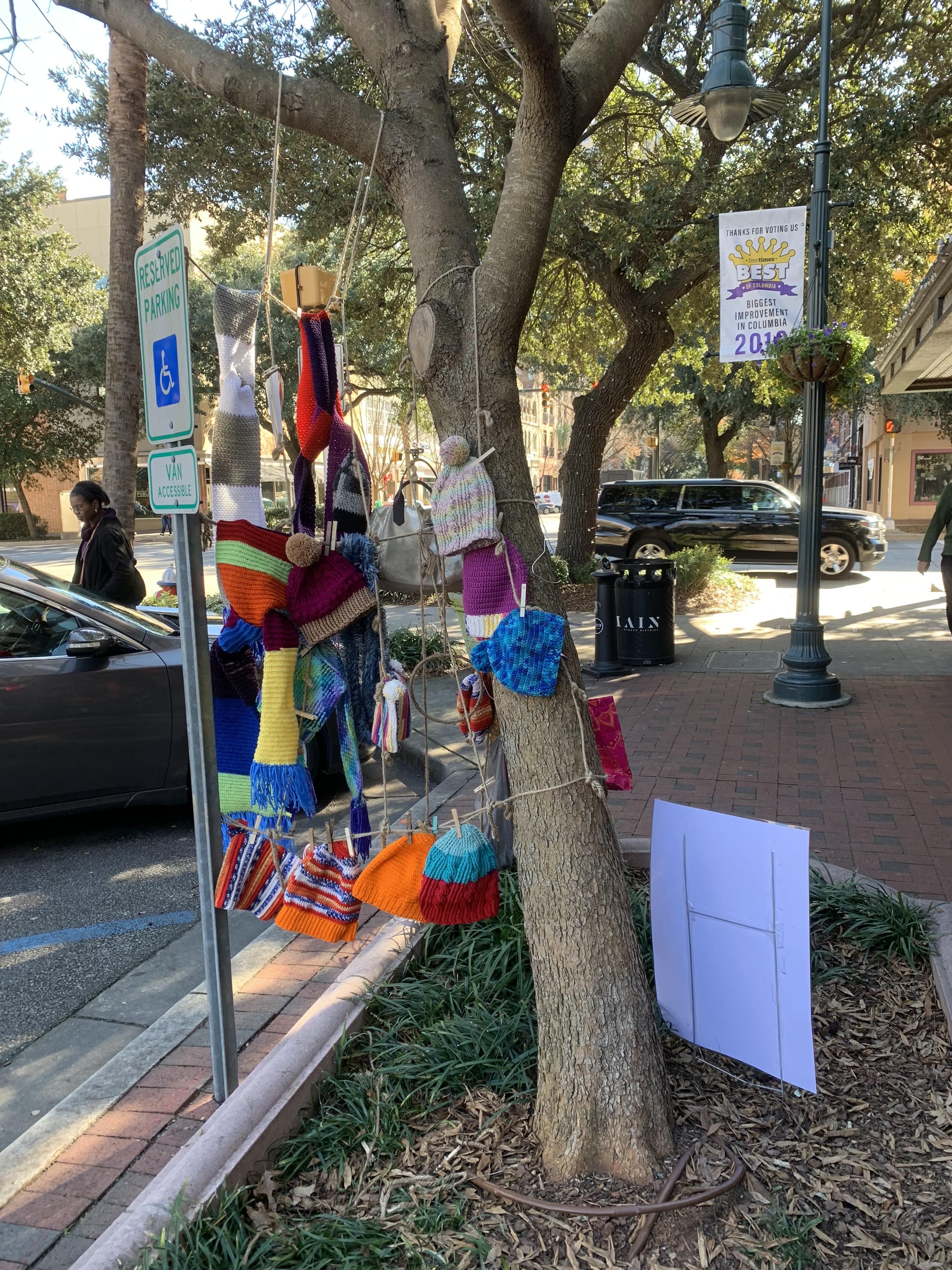Decorated this Giving Tree with Hats and Scarves! r/crochet