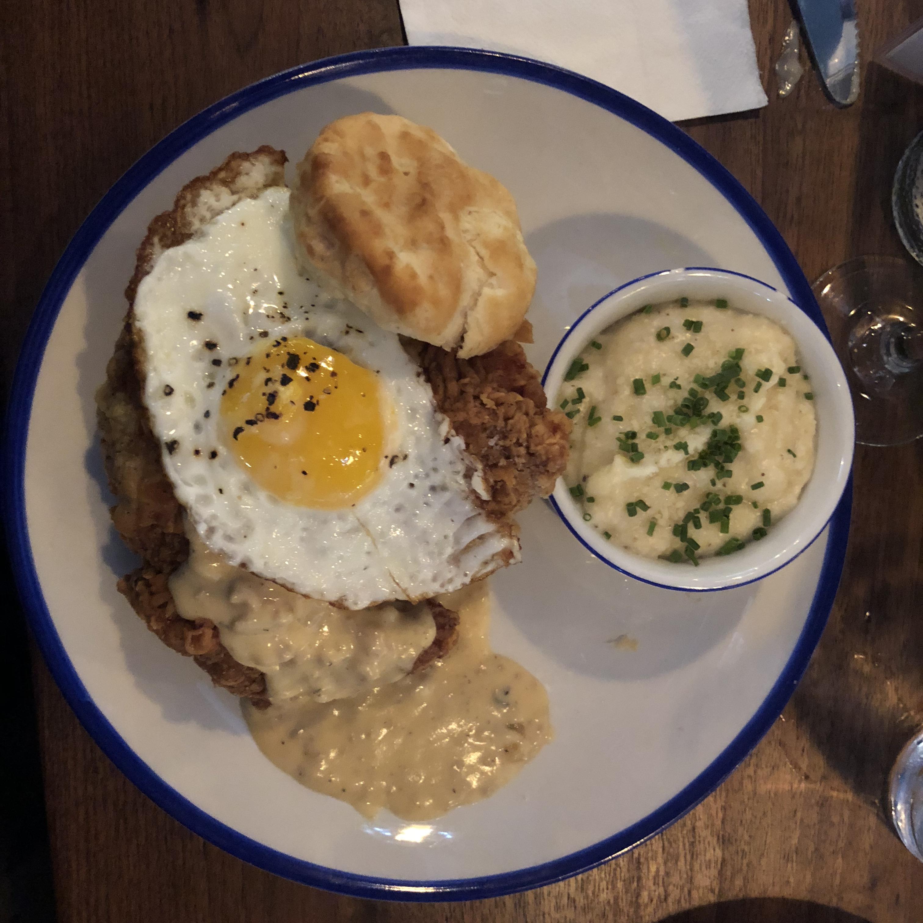 Fried chicken biscuit & gravy with 4 cheese grits. r/FoodPorn