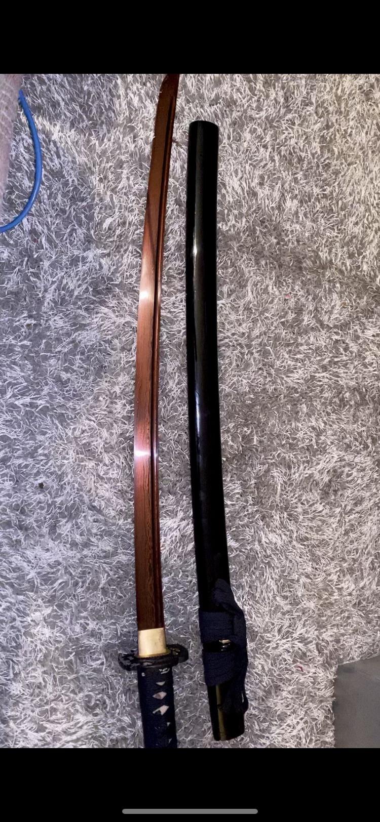 Check out this Sword I got at a pawn shop for 150 r/SWORDS