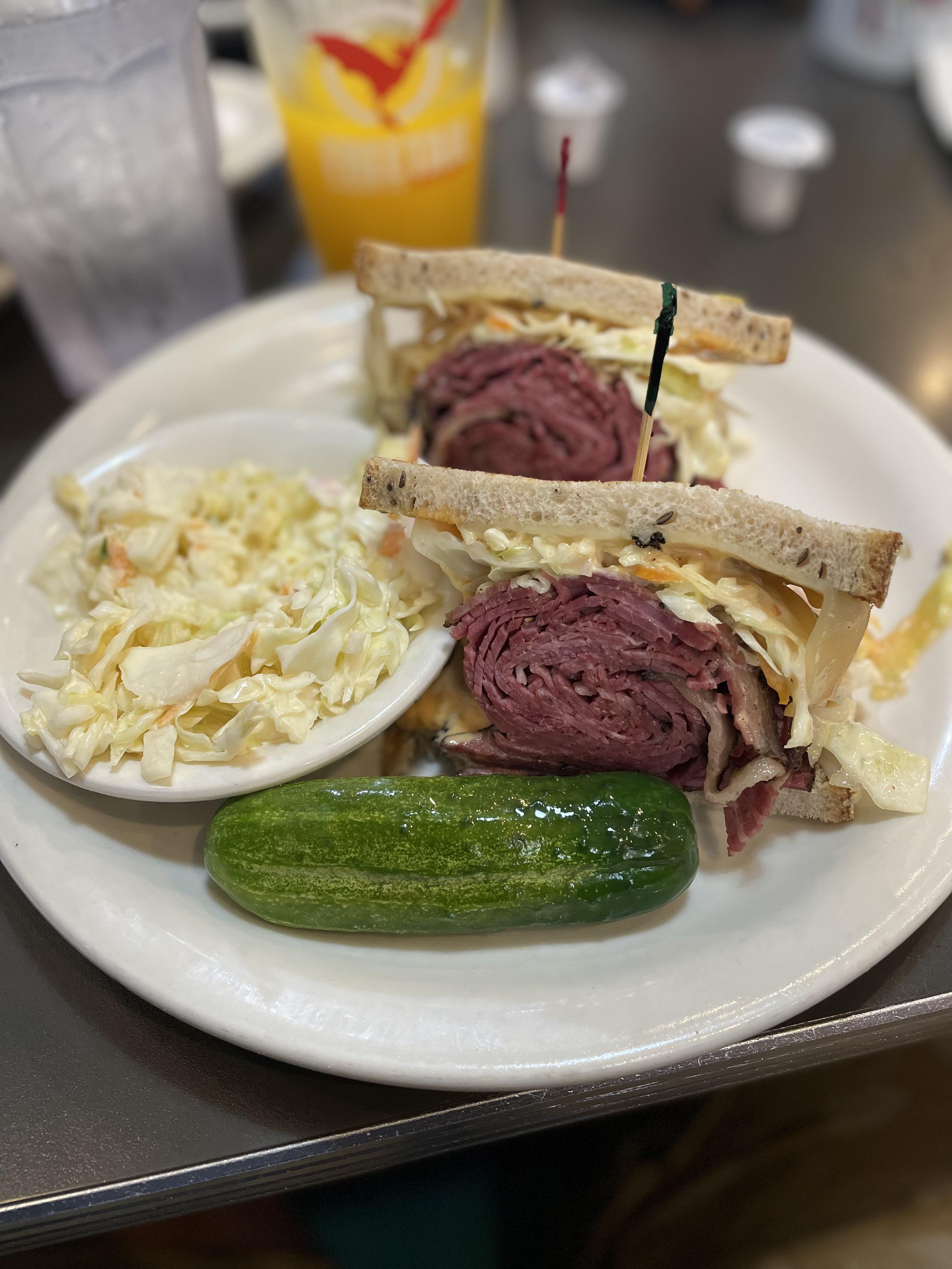 The Rachel (pastrami, corned beef, Swiss, thousand island, slaw, rye