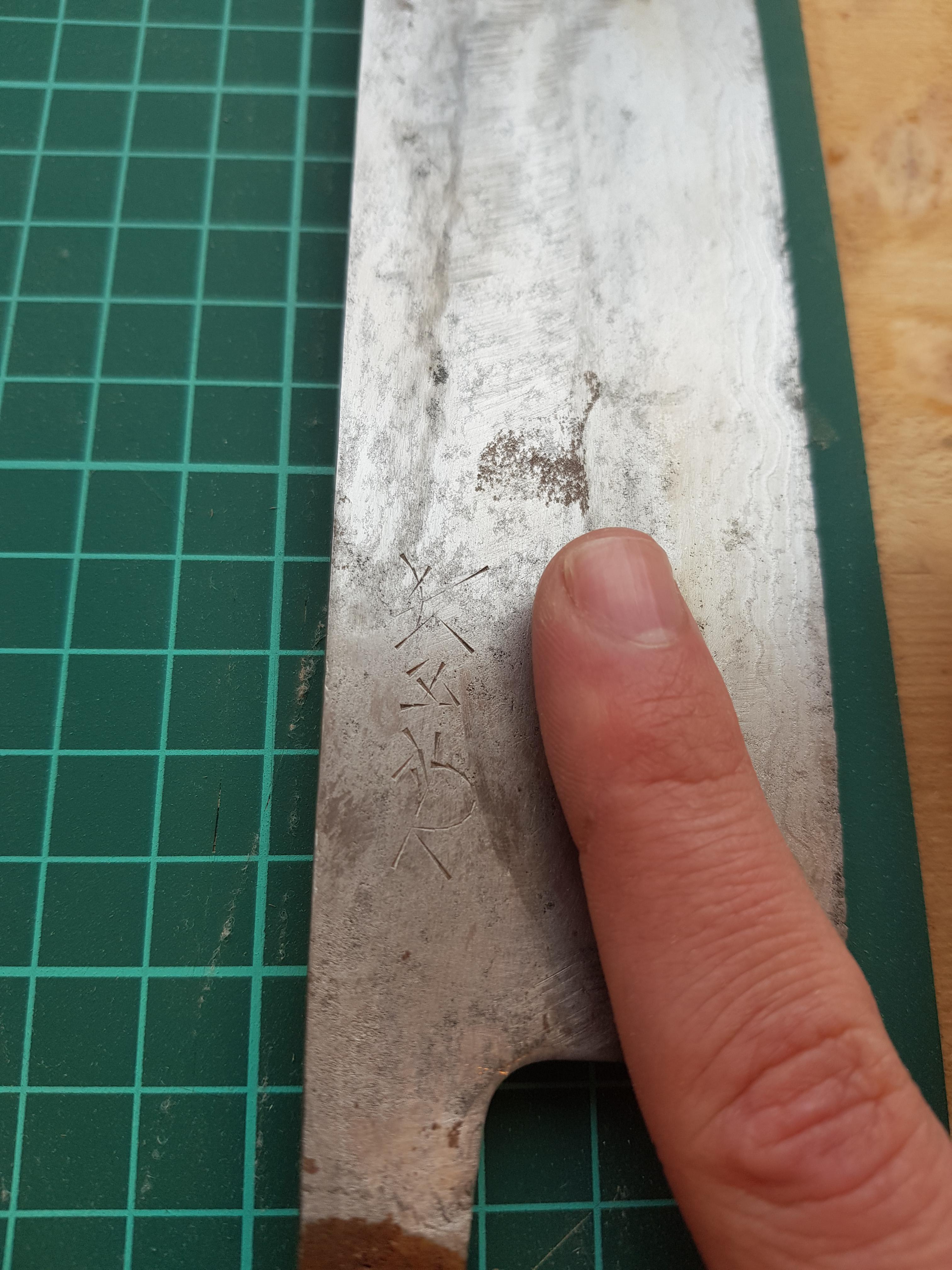 [Japanese > English] What does this chiseled kanji mean? r/translator