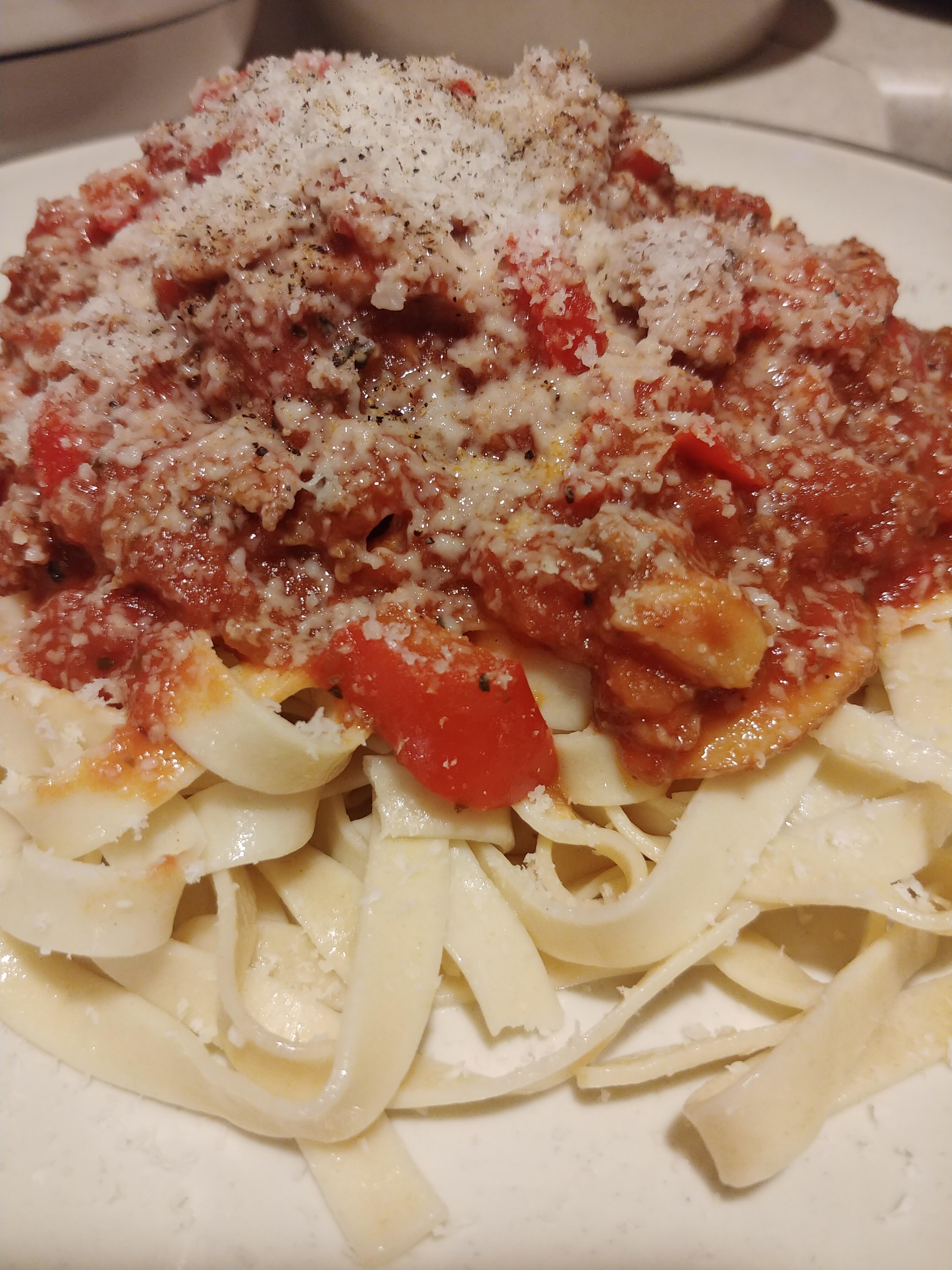 [Homemade] Hand made fetuccine with marinara meat sauce. Topped with