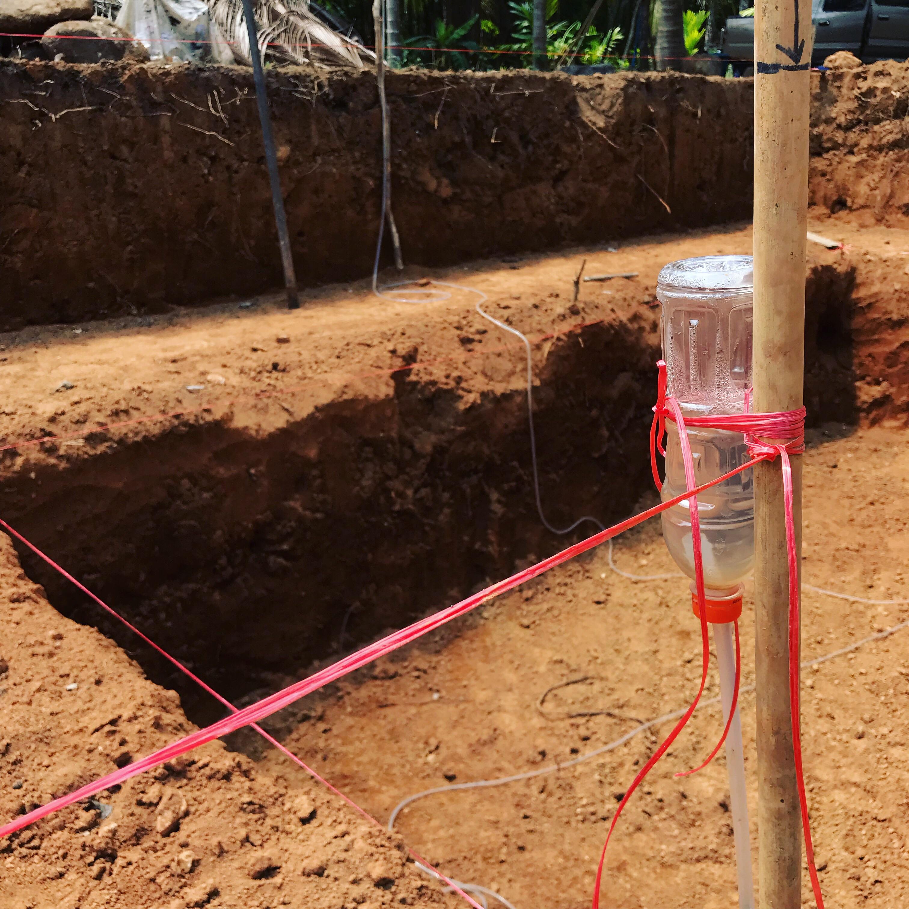 Finding levels on your homestead with old technology. A bottle, water
