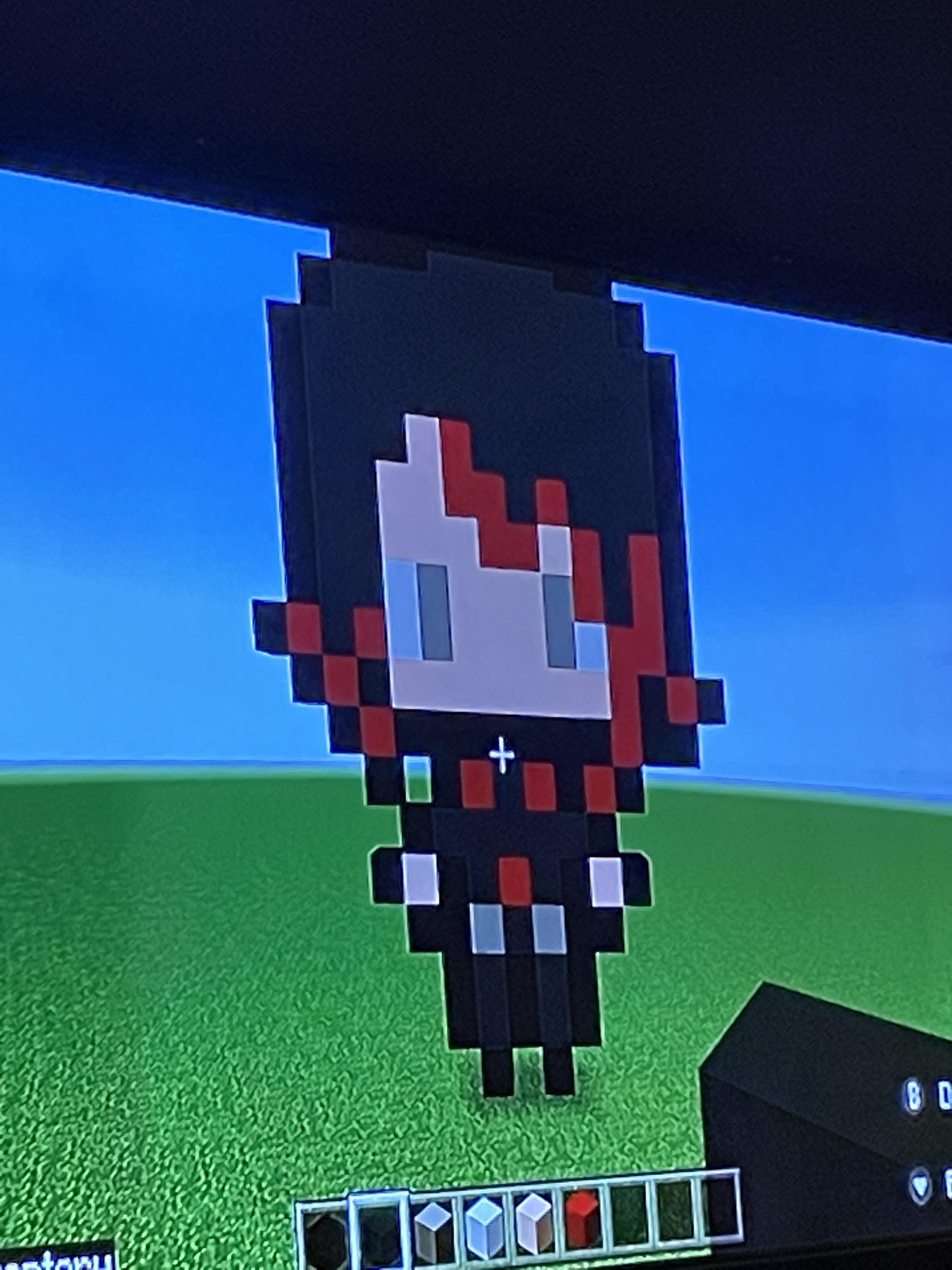 Using my bead art as a reference, I made Ruby pixel art in Minecraft