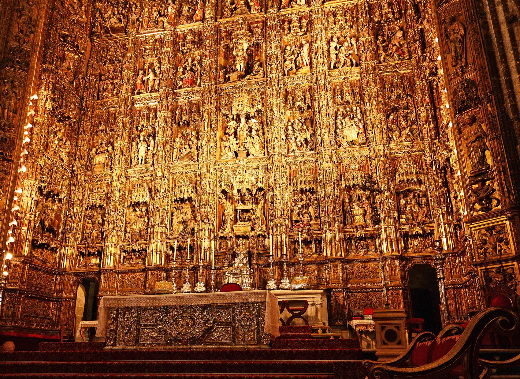 Golden altar in the Seville Cathedral. Whole made of gold and silver