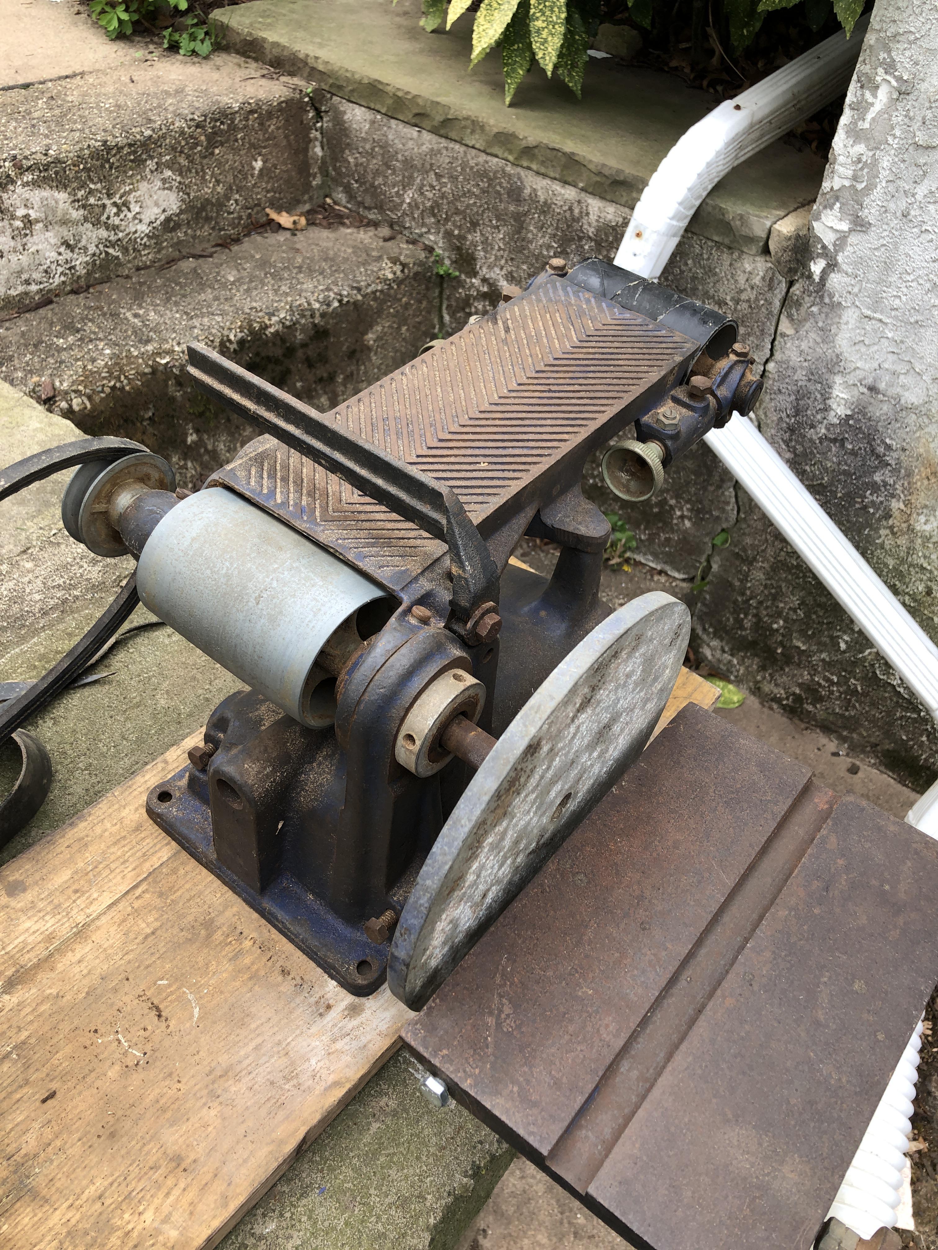 Old sears belt disk sander , how to I put on a new belt?? Anyone have a