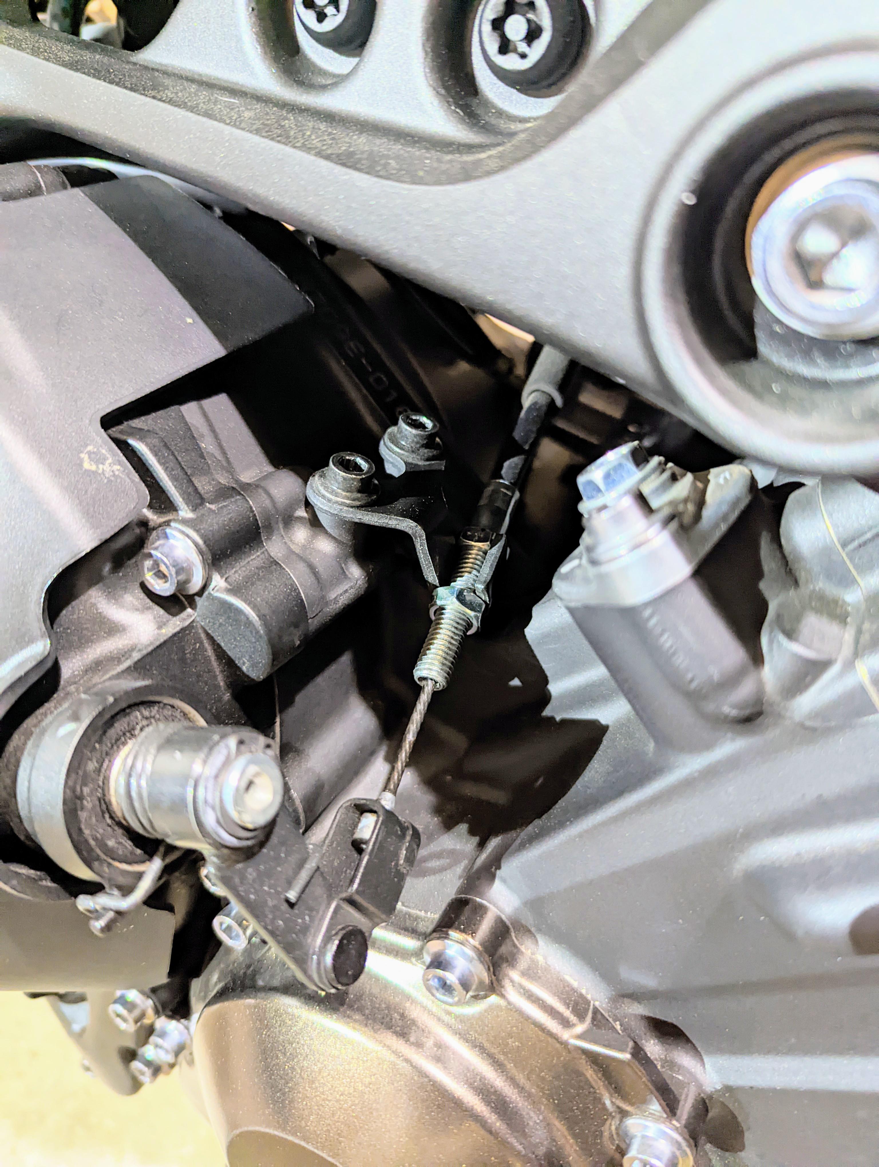 Anyone ever adjust clutch cable by the clutch case? Tried tightening