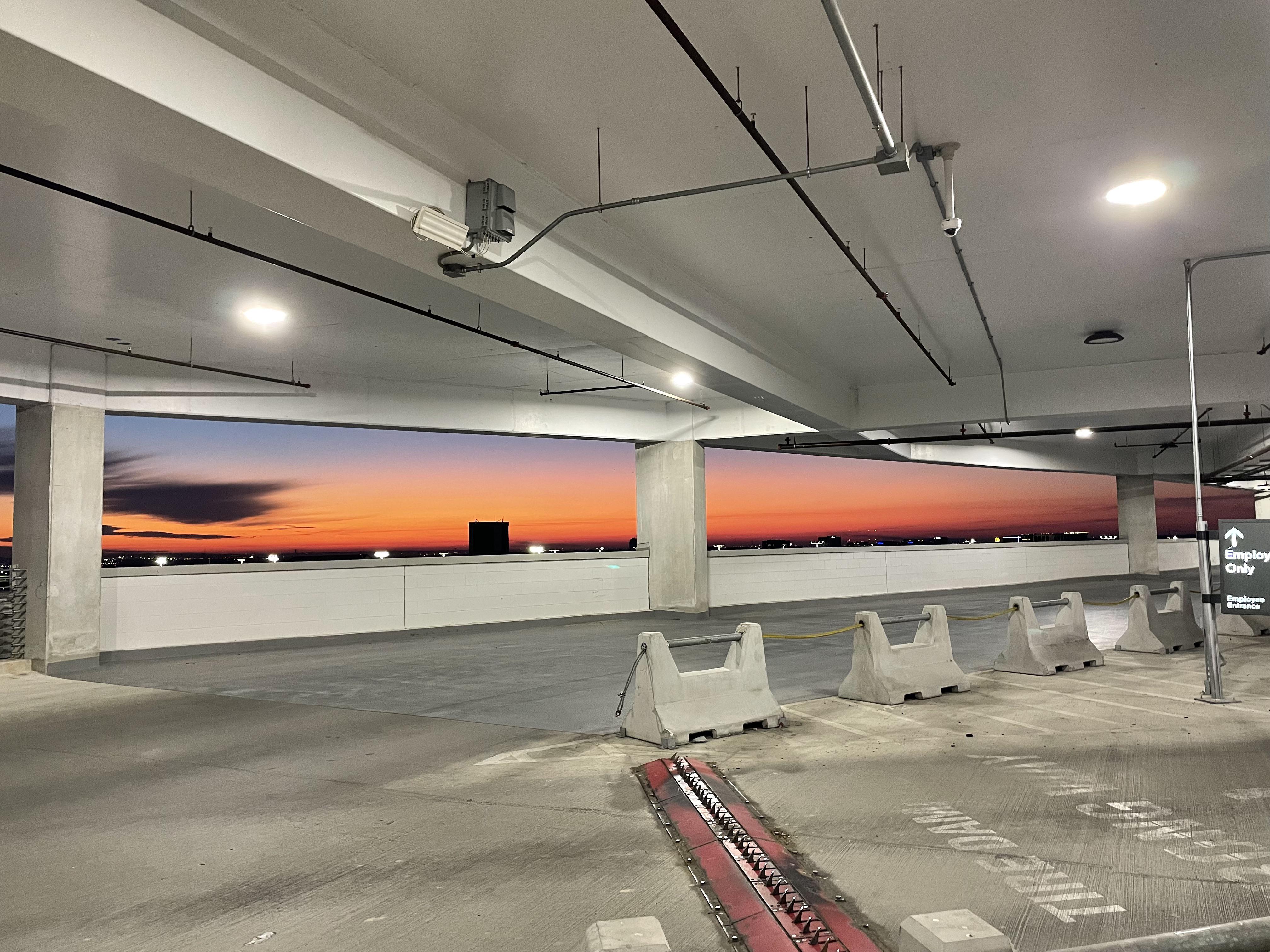 Sunrise at the SAT Airport rental car parking garage. Almost looks like