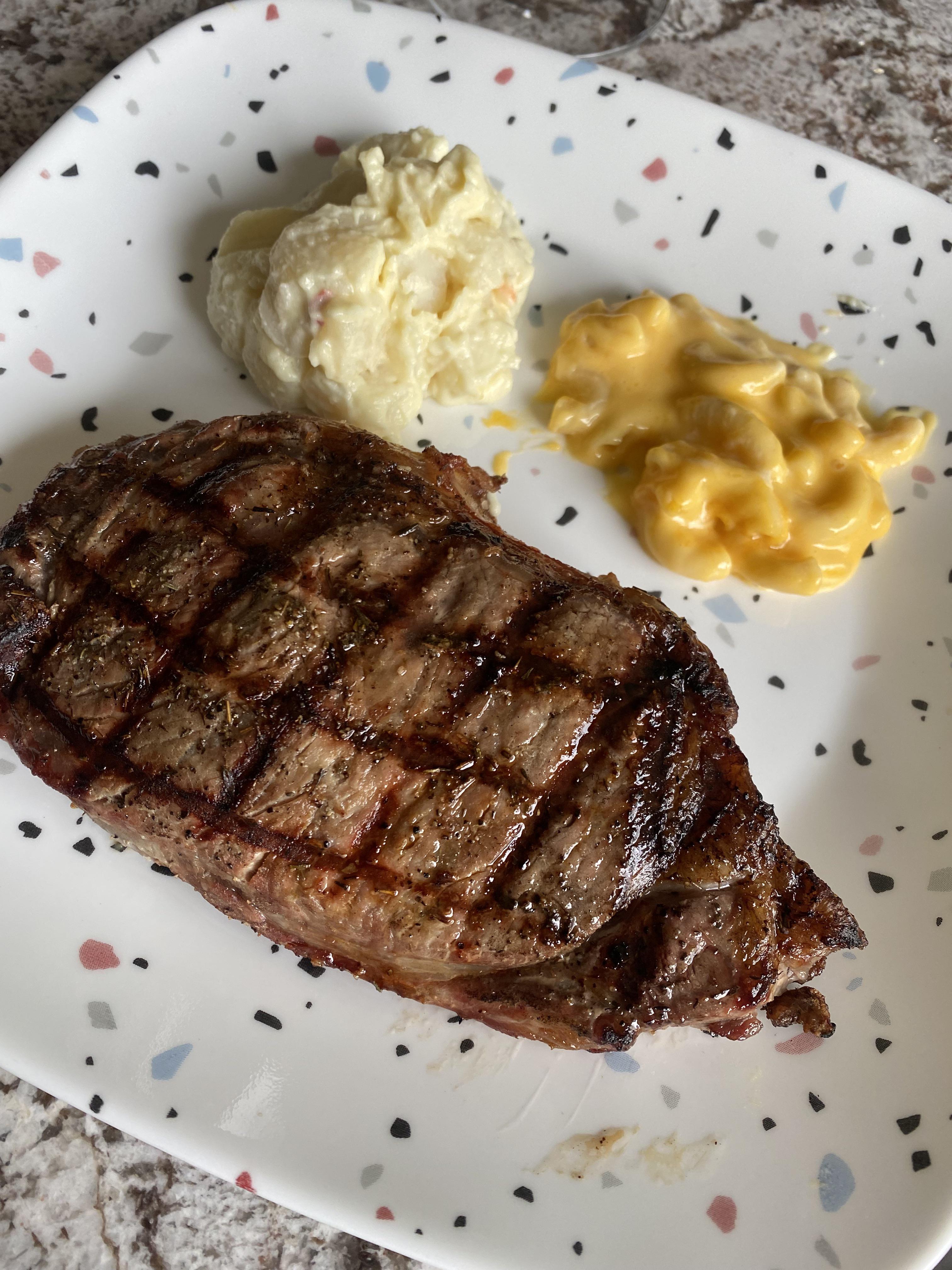 Ribeye with potato salad and Mac & Cheese r/tonightsdinner