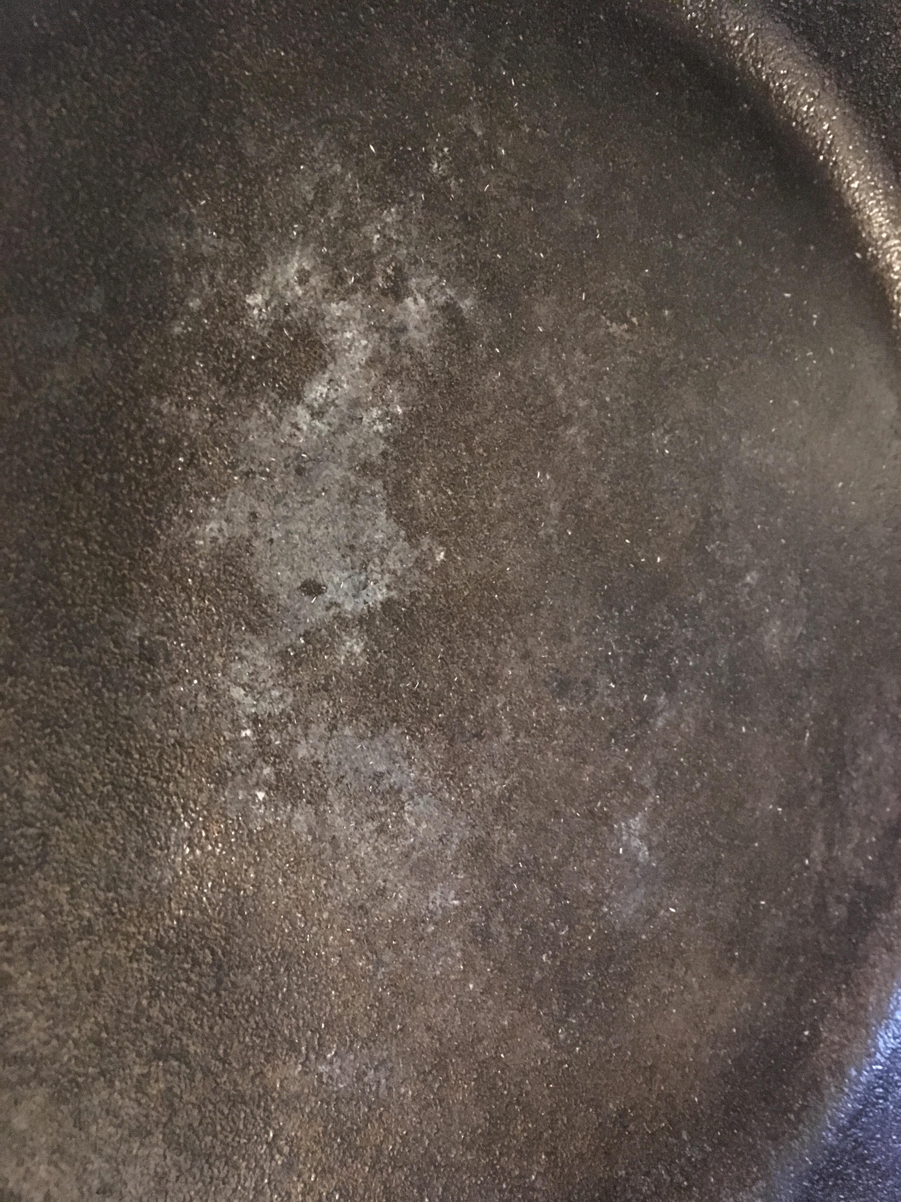 White residue in new pan? I’m new to this, seasoned it three times but