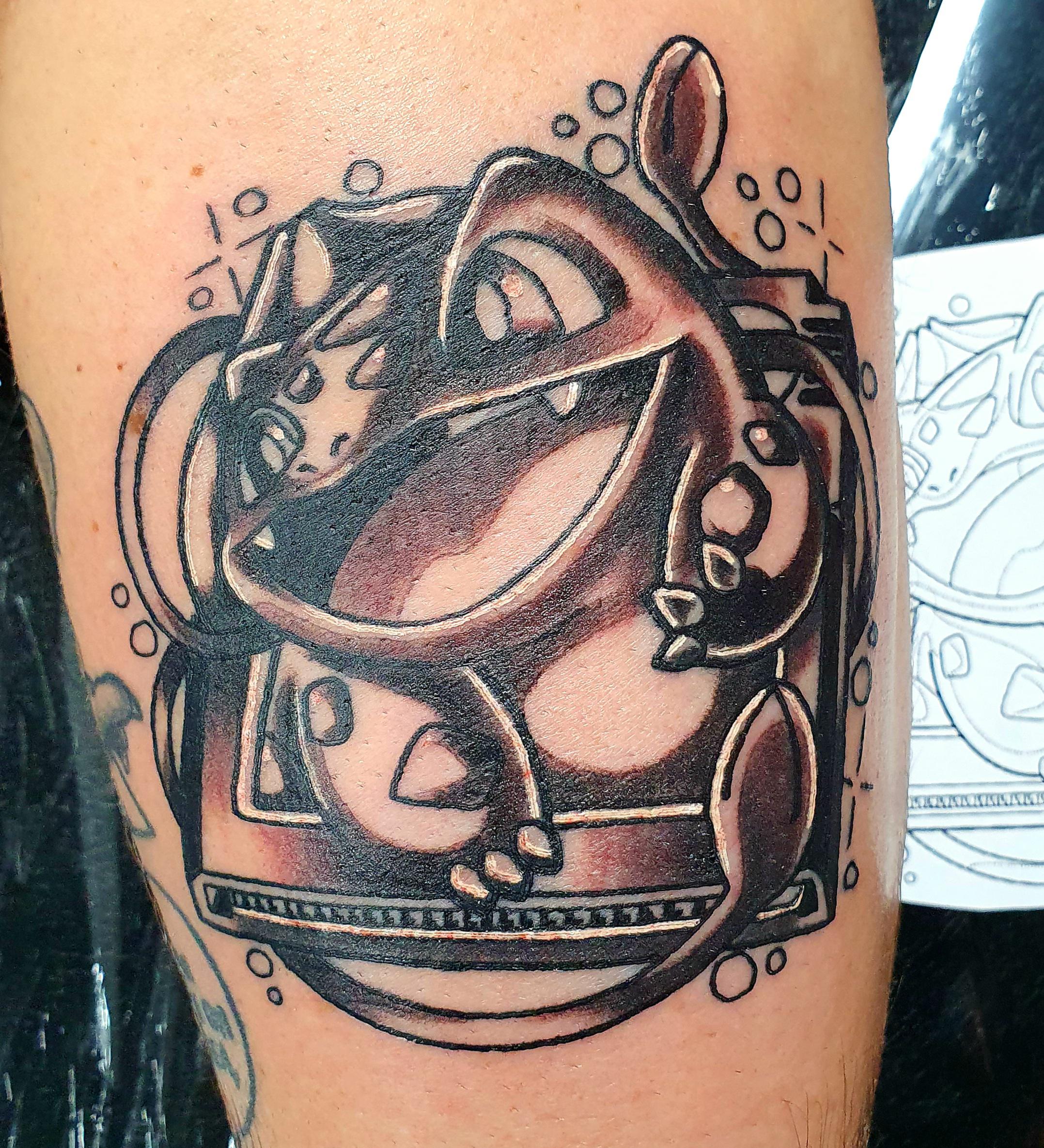My first Pokemon tattoo! Bulbasaur jumping out of a Gameboy cartridge