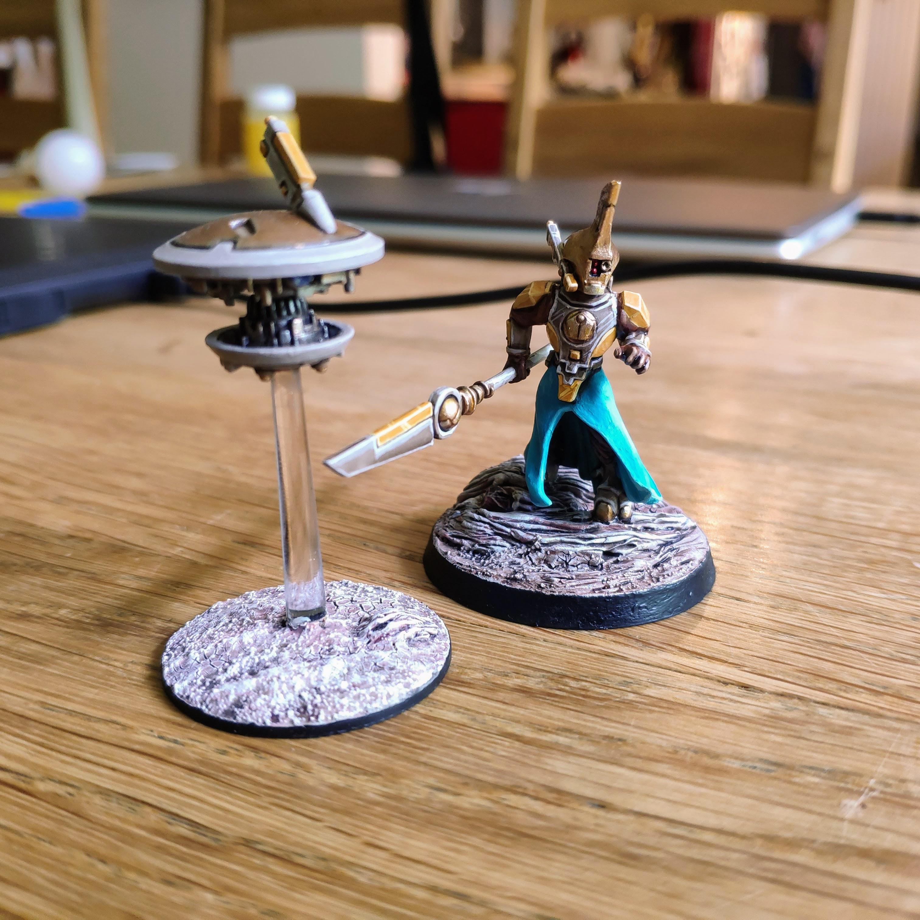 Here is the painted Ethereal helmet conversion, with her loyal shield