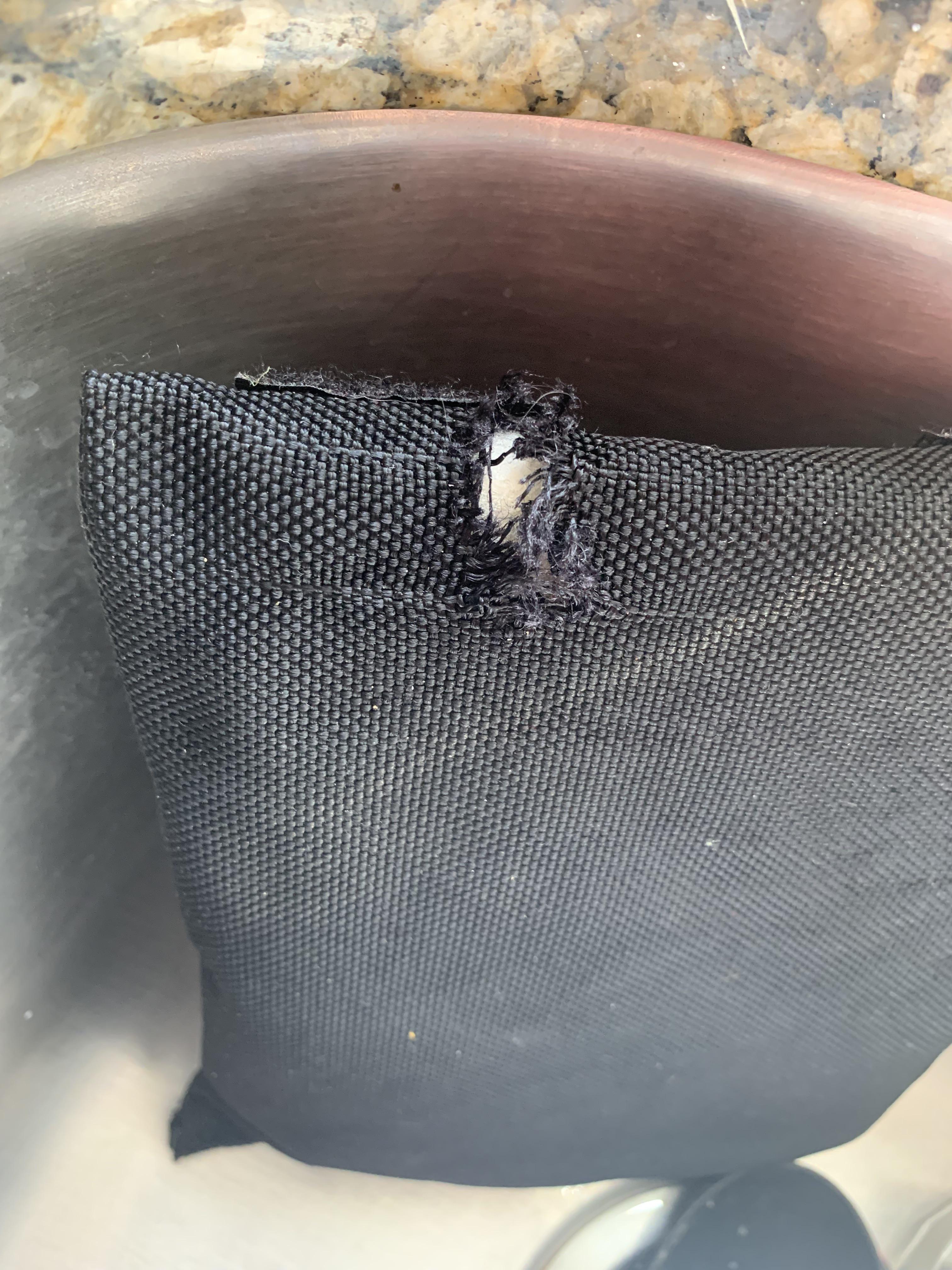 Below is 1680D ballistic nylon my dog was able to tear though, any