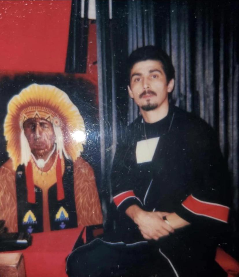 Former Spanish lord chief corky posing by a Native American chief