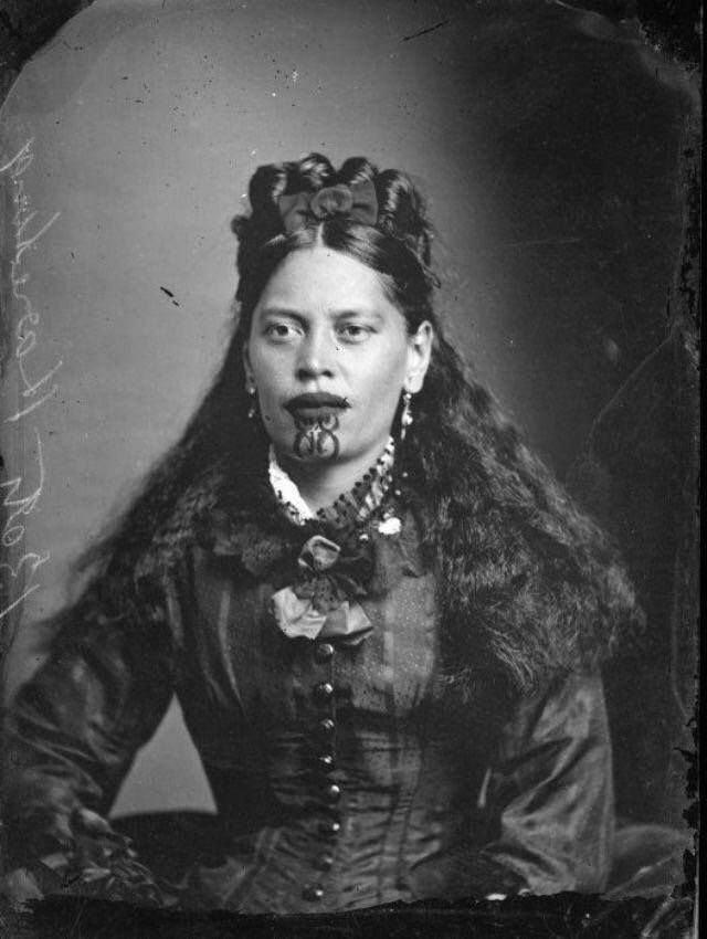 A Maori woman with traditional moko tattoos, New Zealand, 1905. r