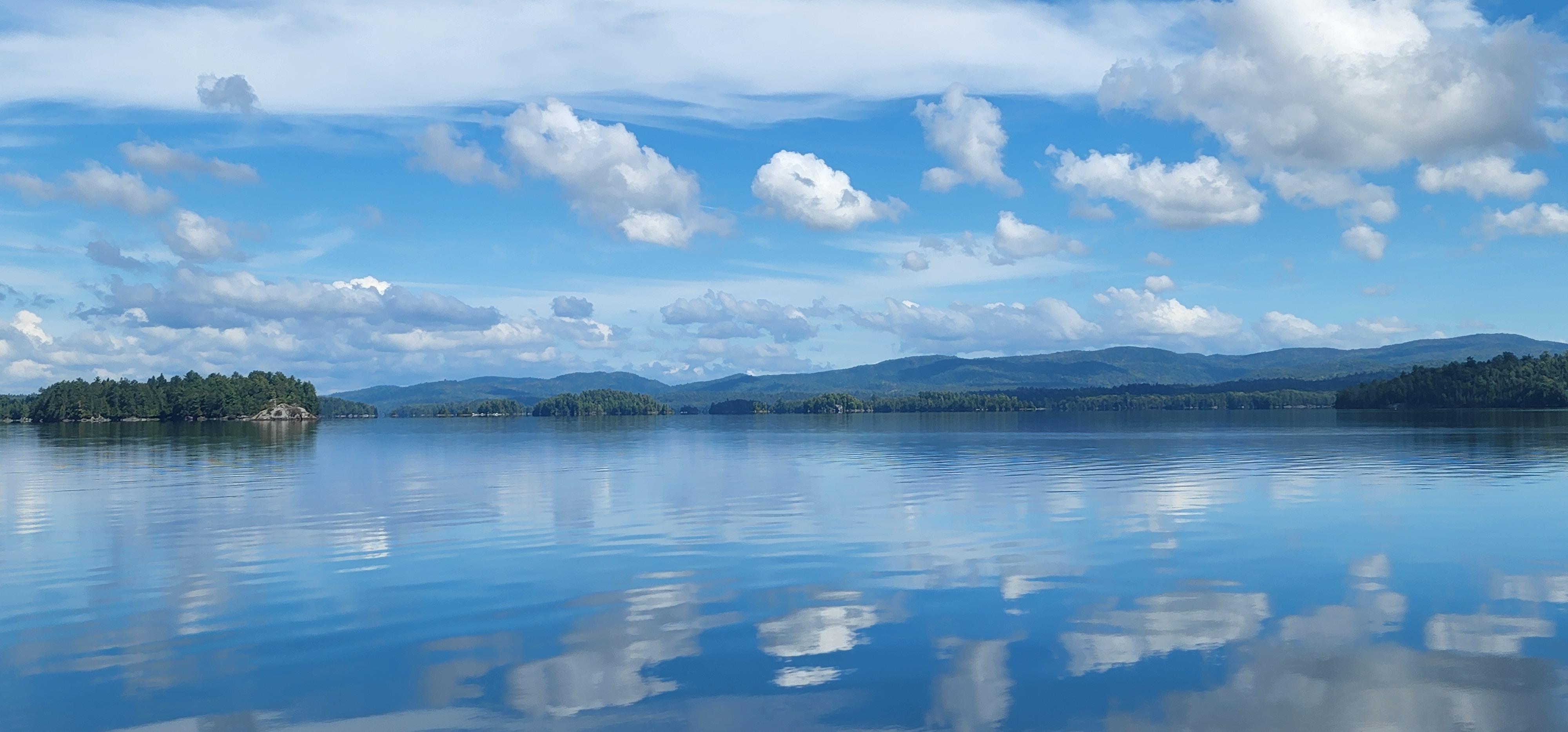 Miles of Mirror 31 Mile Lake, Quebec, Canada[4000x1868][OC] r/EarthPorn