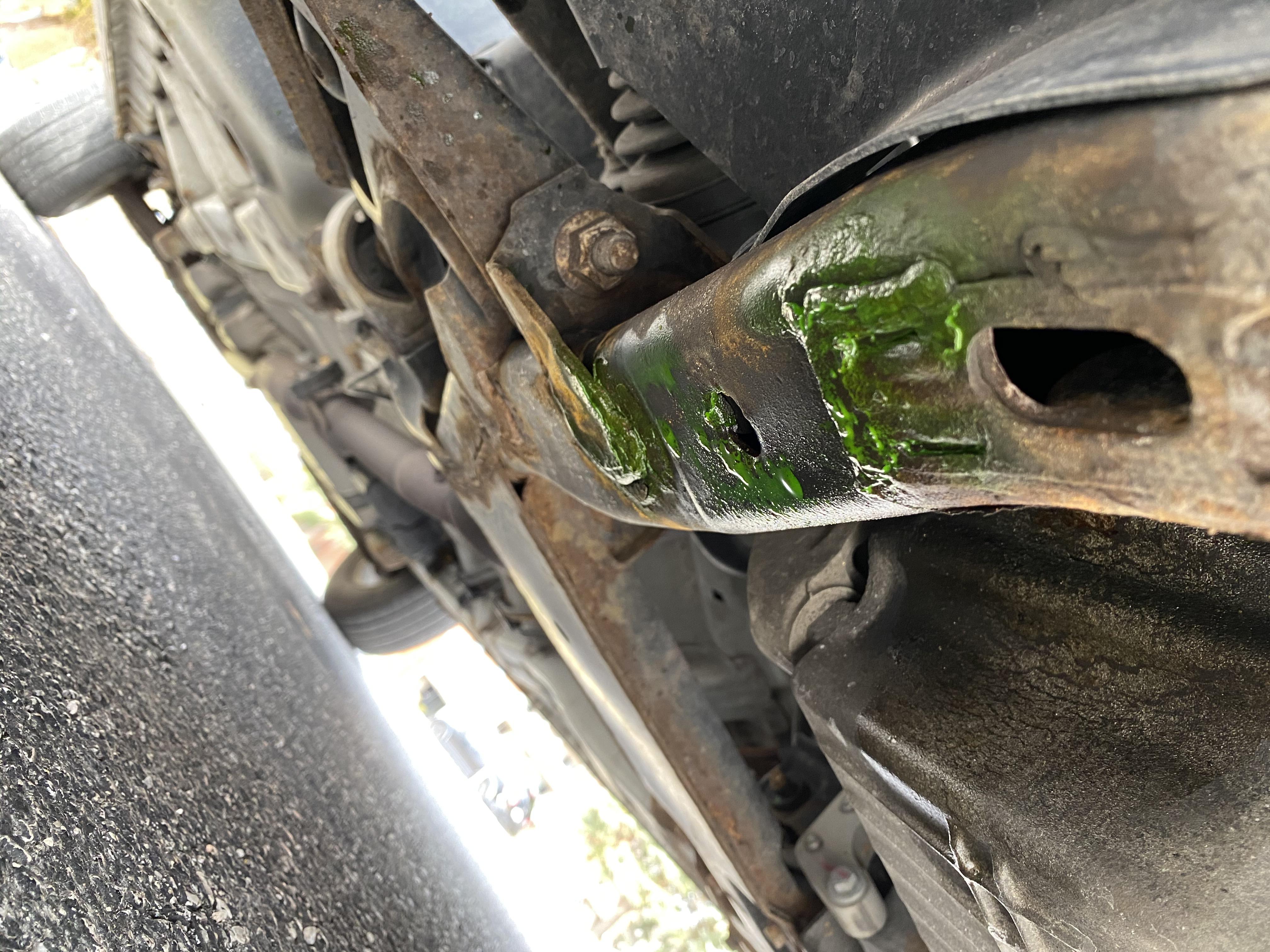What is this and how did it get there? Found a puddle under my car and