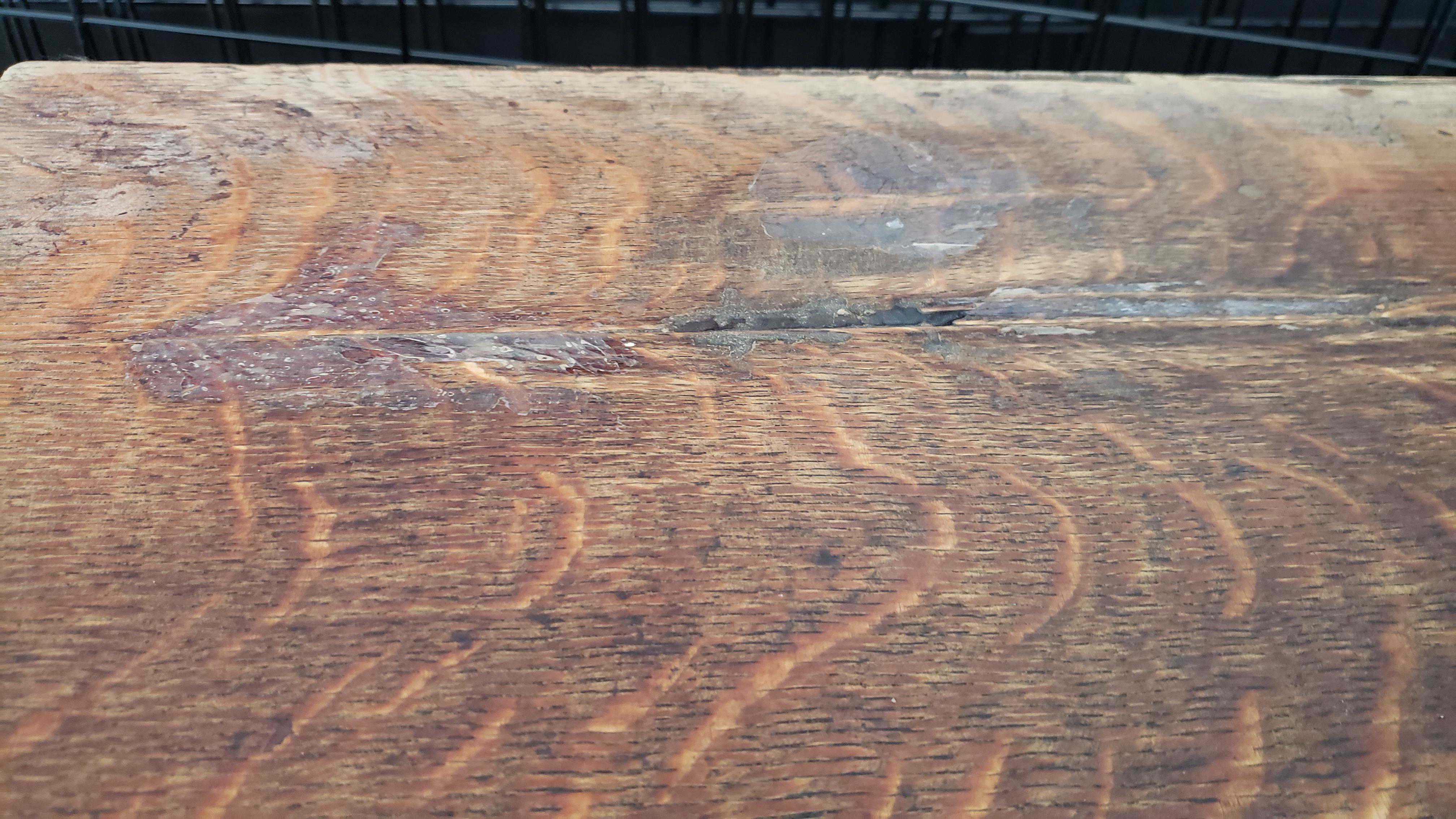 How do I flatten out this rippled veneer on an old singer sewing