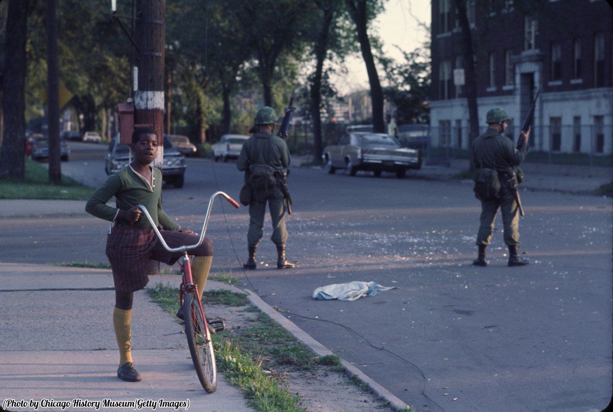 National Guardsmen stand guard after the rioting that
