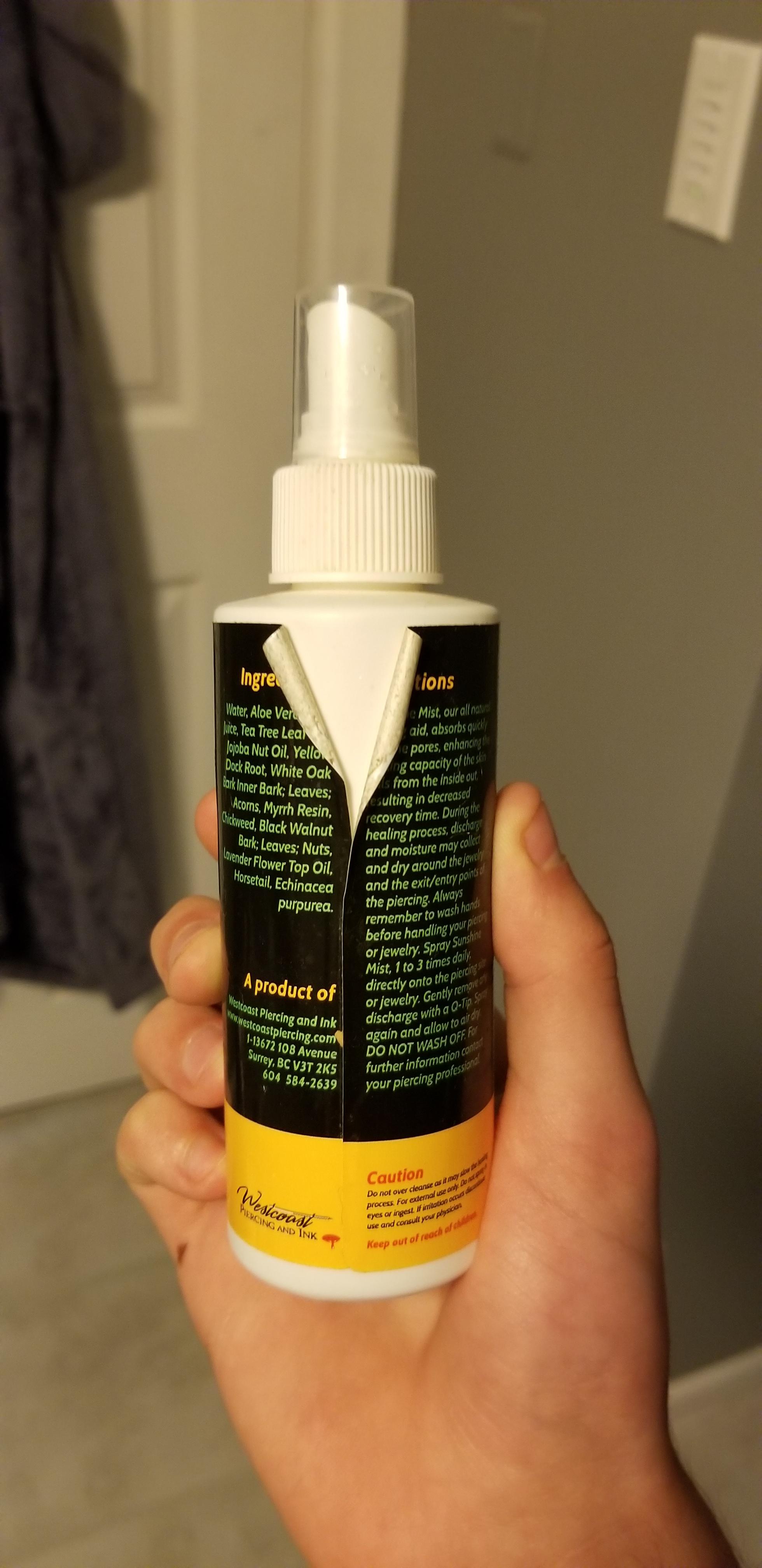 This spray bottle looks like it's wearing a collared shirt r