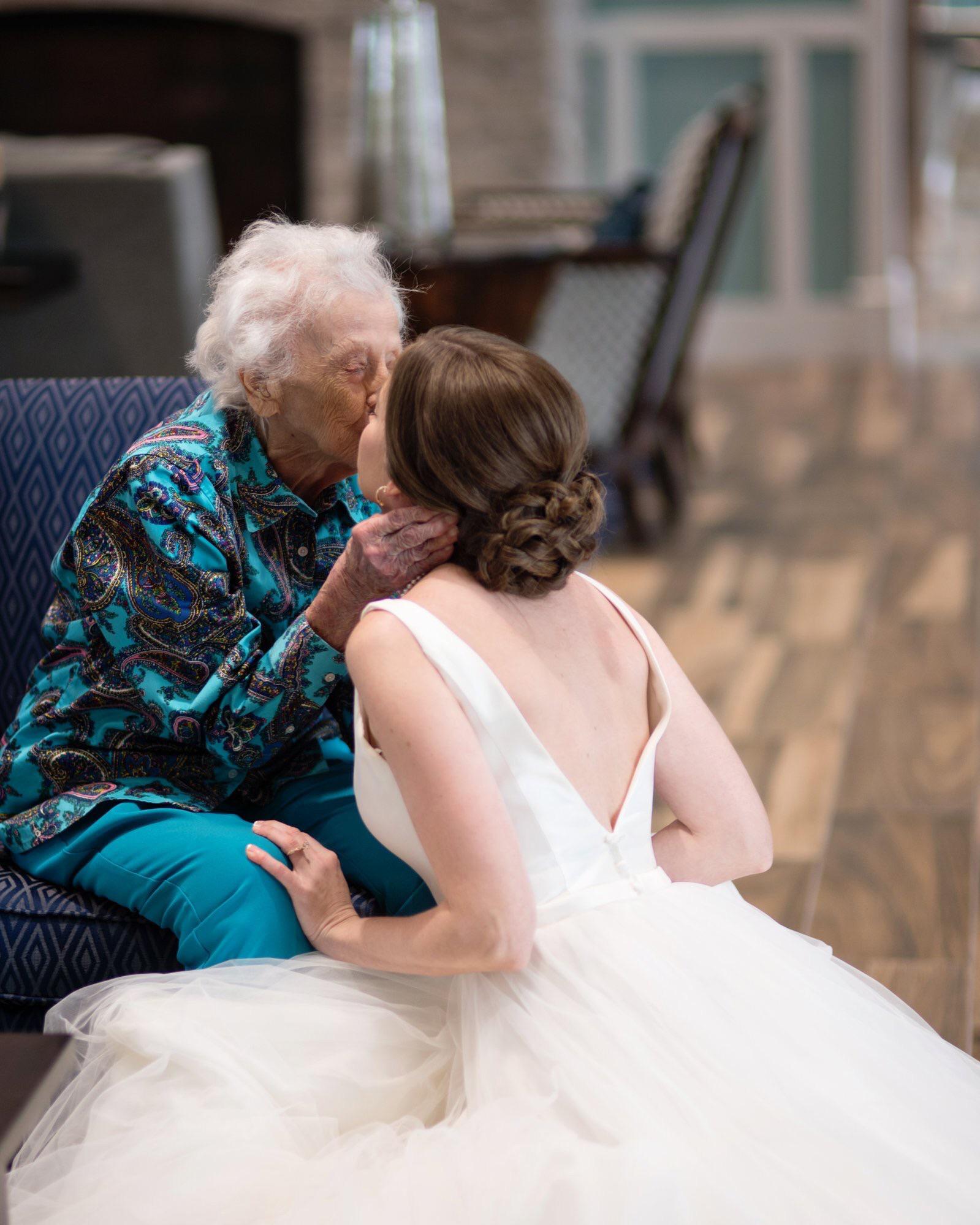 Bride brings her wedding dress to see her 102 year old Grandma who is in a hospice. aww