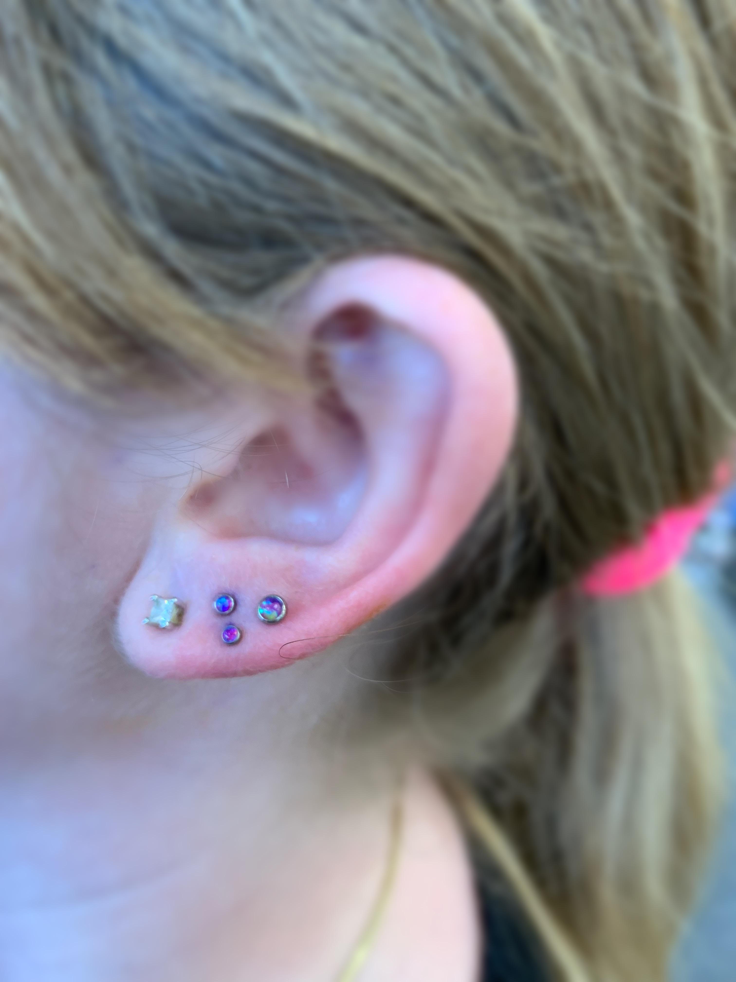 Fresh triple lobe piercings ) r/piercing