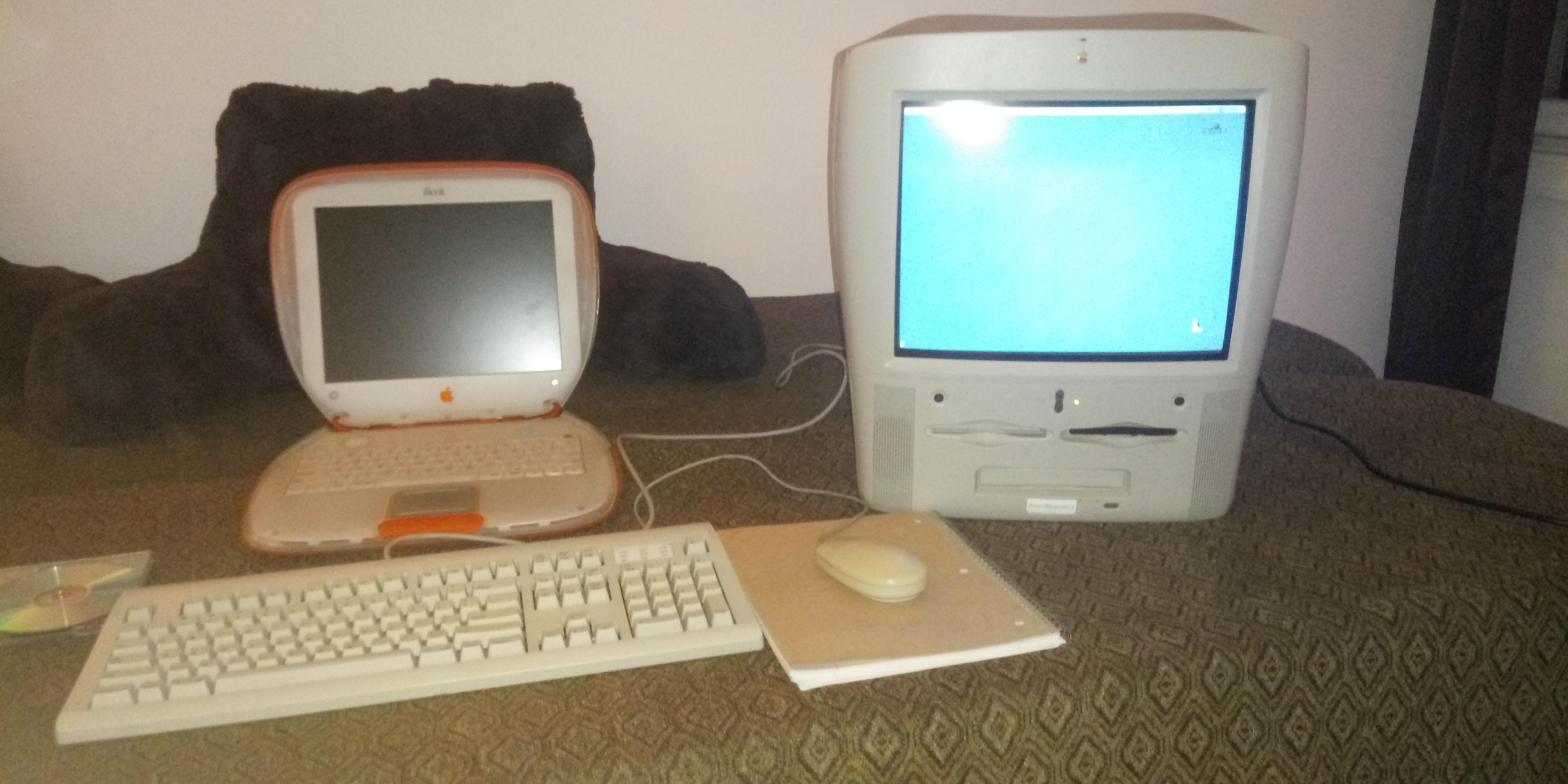 My tangerine iBook from college and a well worn G3 Molar Mac I recently