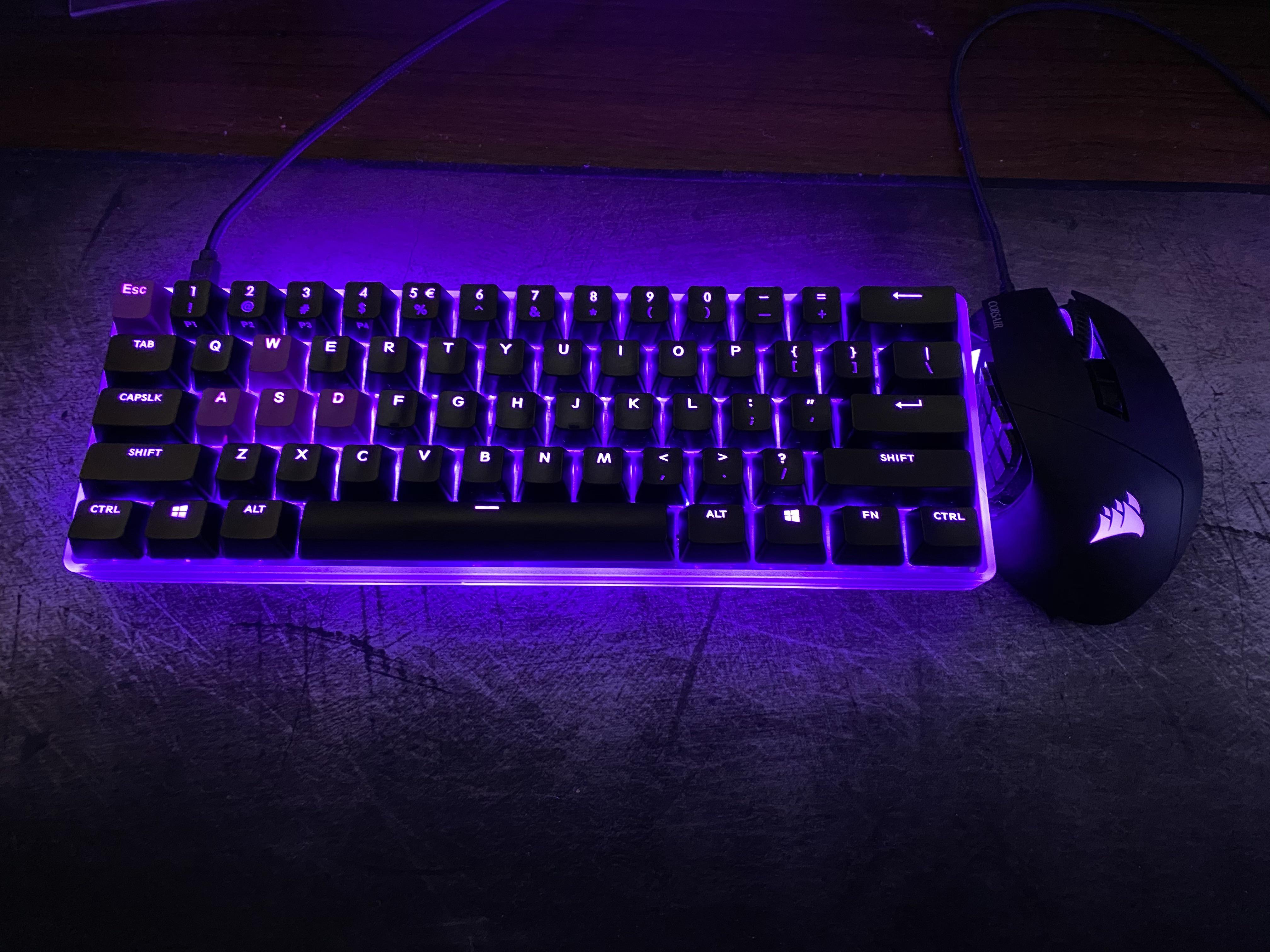 My first custom keyboard. Bm60rgb, clear plastic case, kailh speed