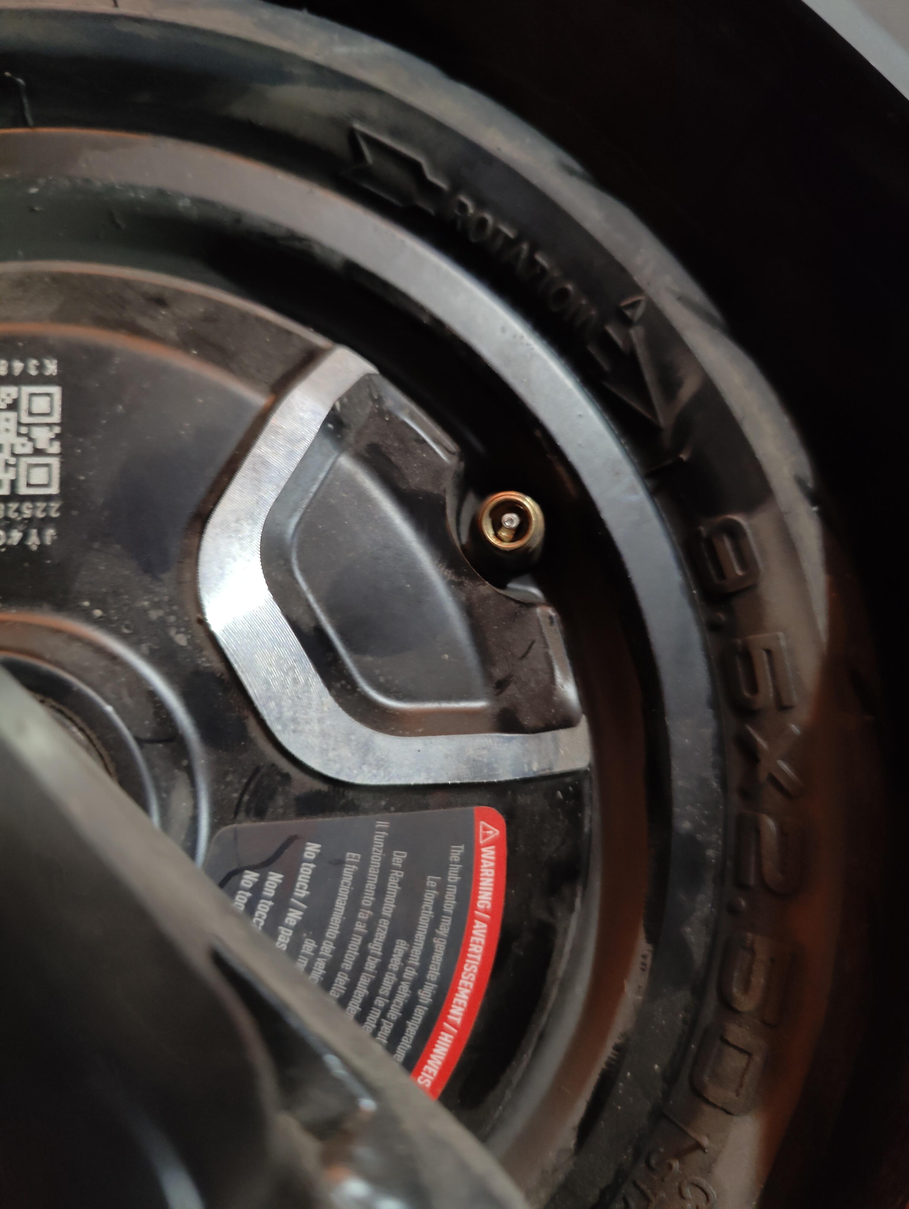 Does anyone know how to get the back tire off of the KQi3 Pro I got a