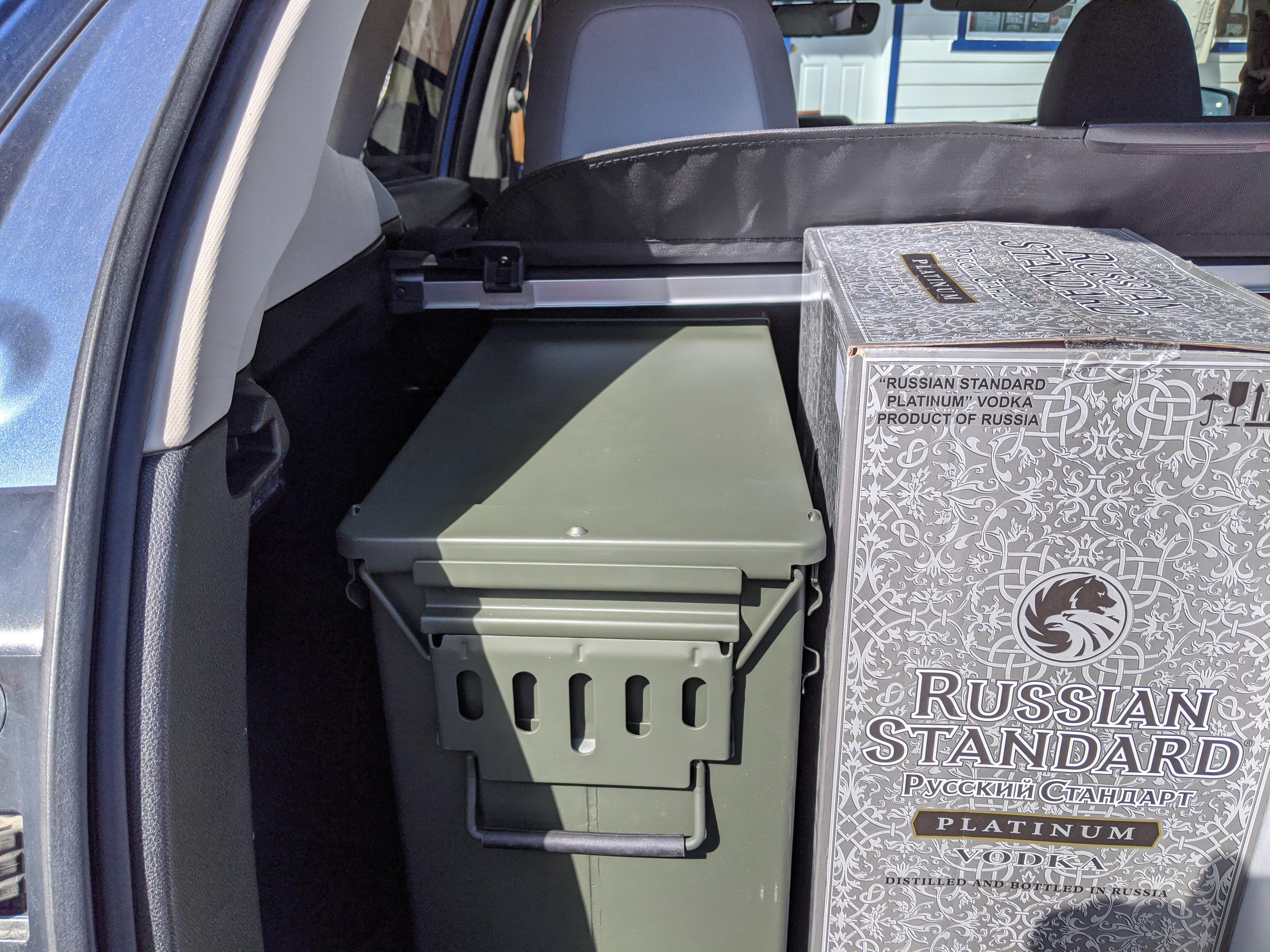 30mm ammo box fits just right under cargo cover. Great for storing