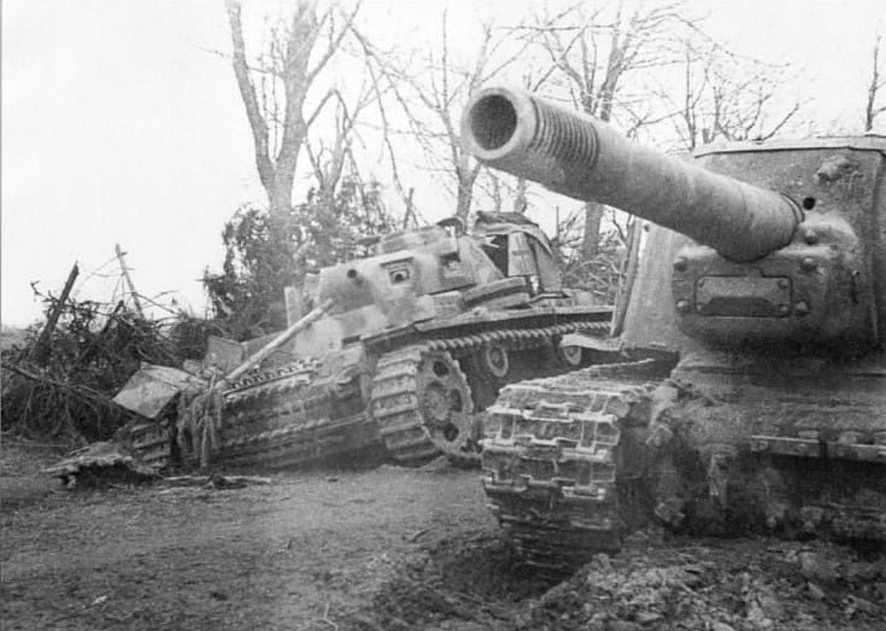 A Soviet ISU152 next to a damaged German artillery observer