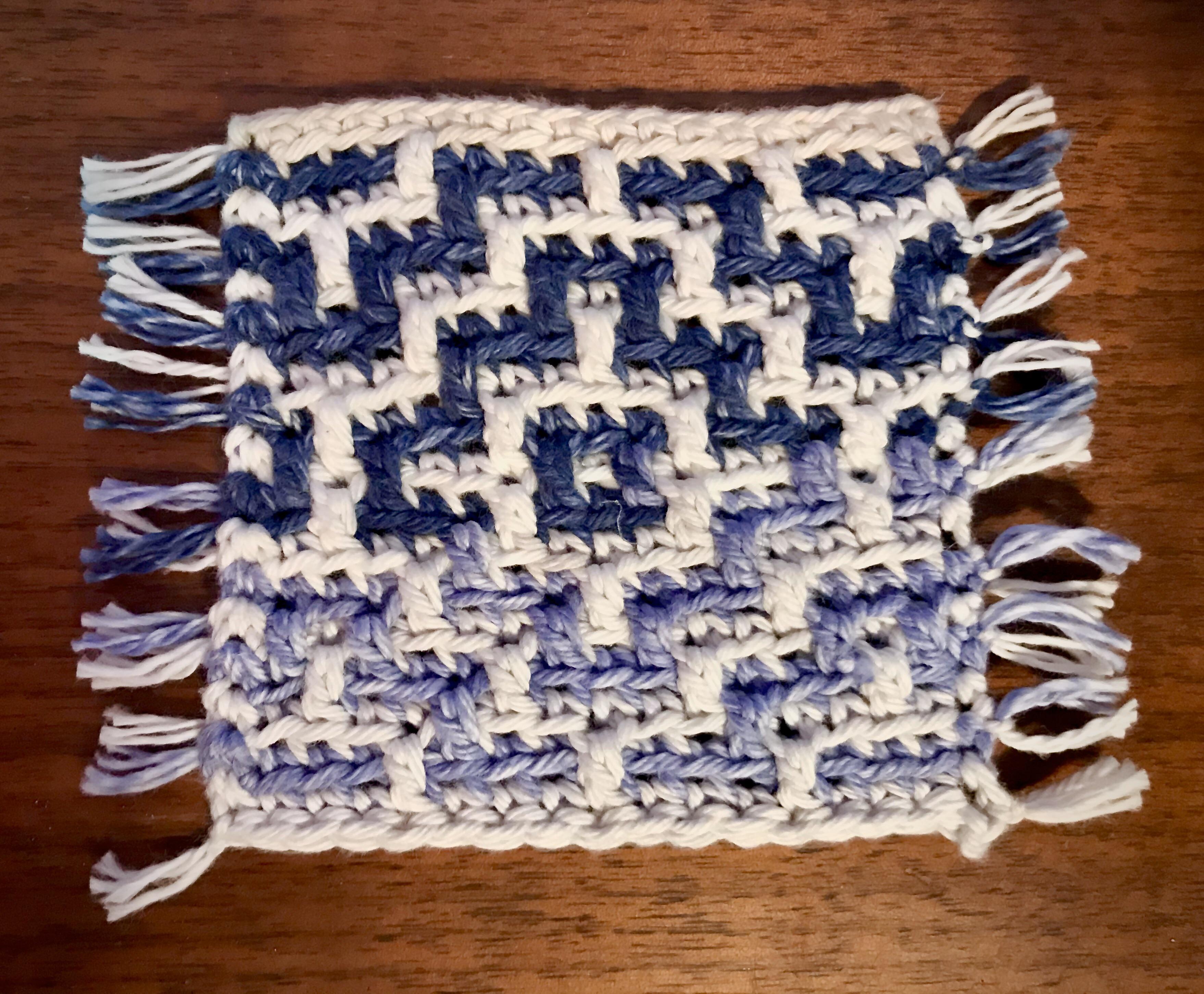My first attempt at mosaic crocheting AND blocking! This coaster was
