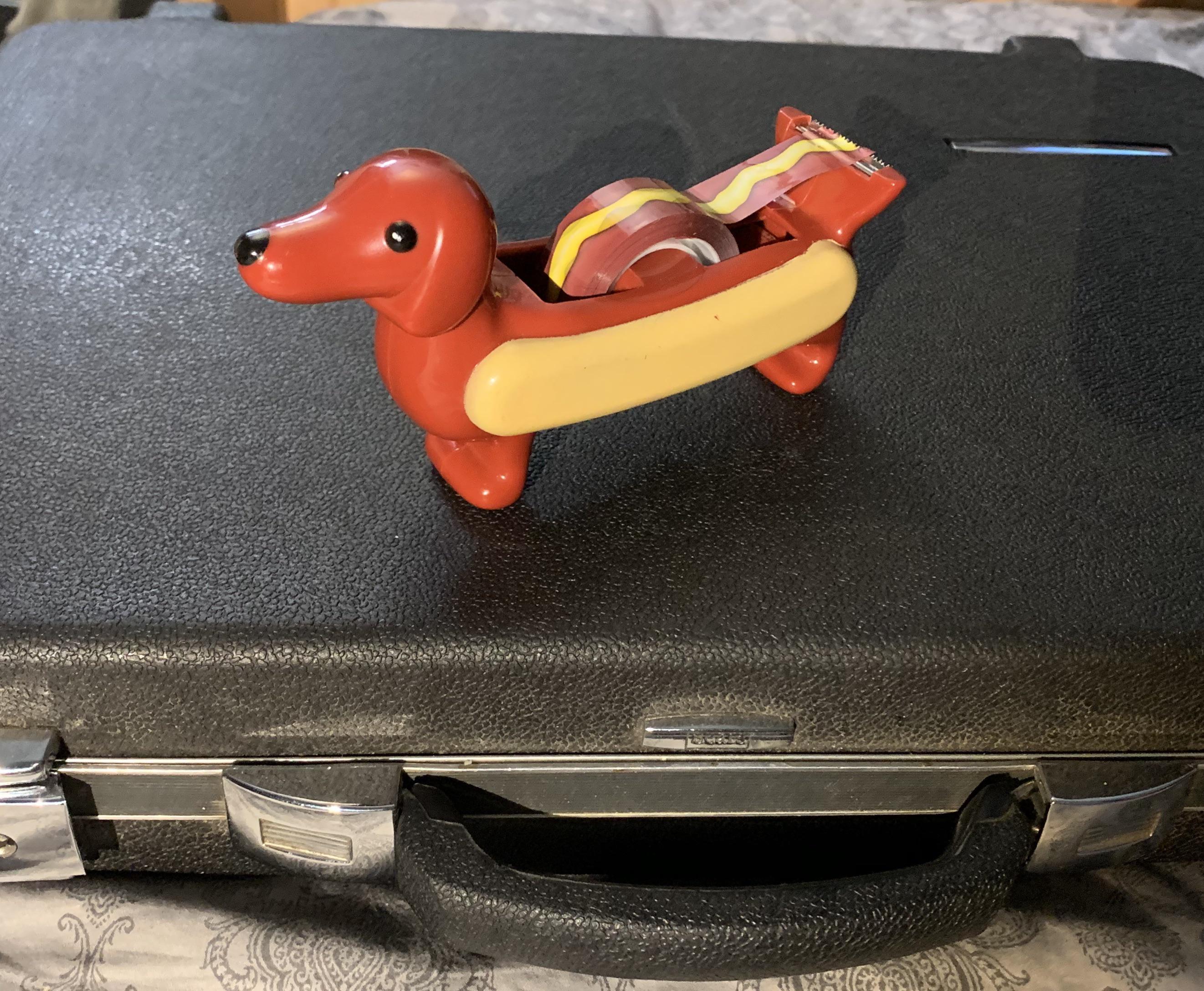 This wiener dog tape dispenser with hotdog and mustard tape. r