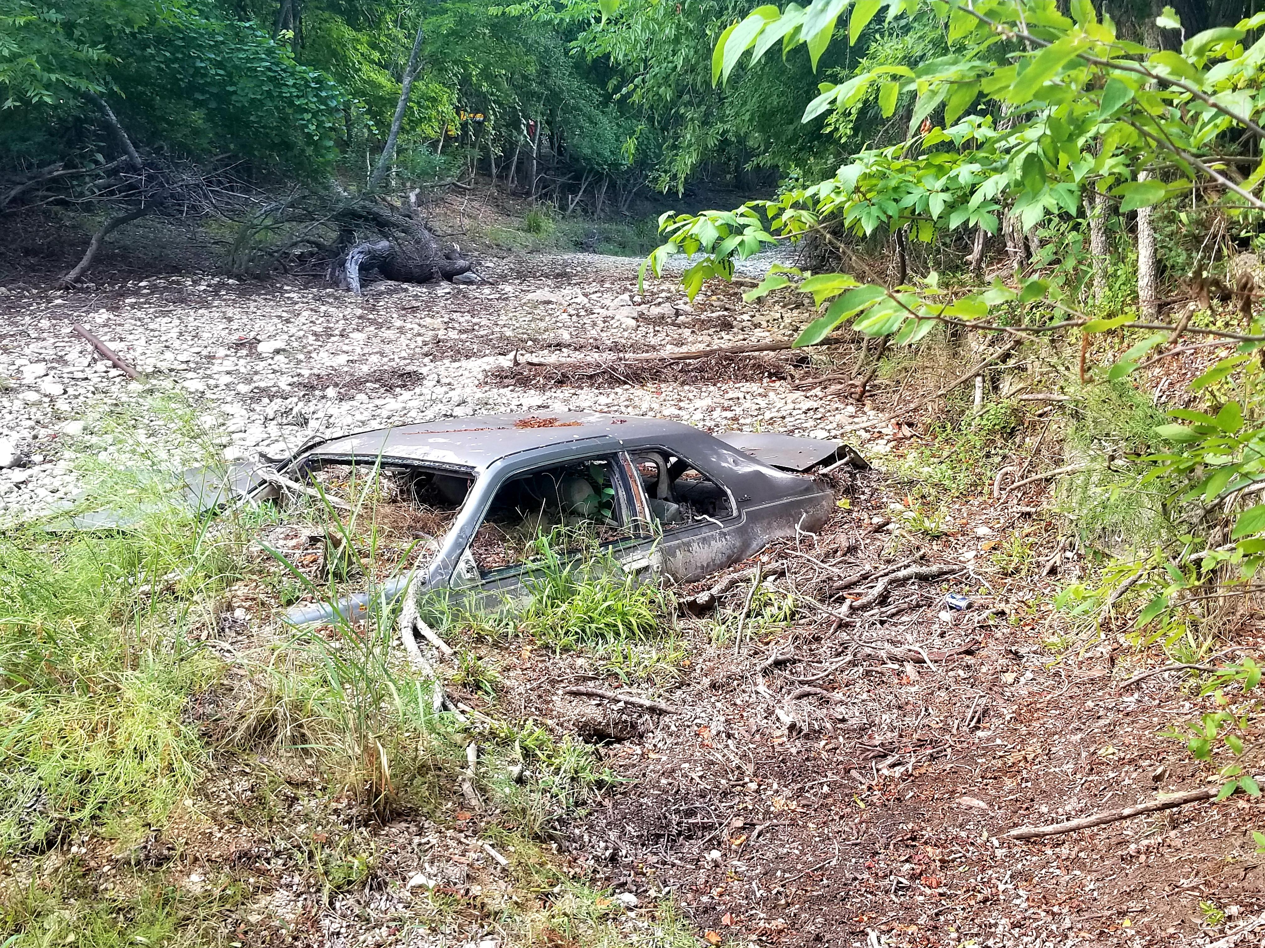 Abandoned car found in a middle of nowhere creek. Boerne, TX [OC