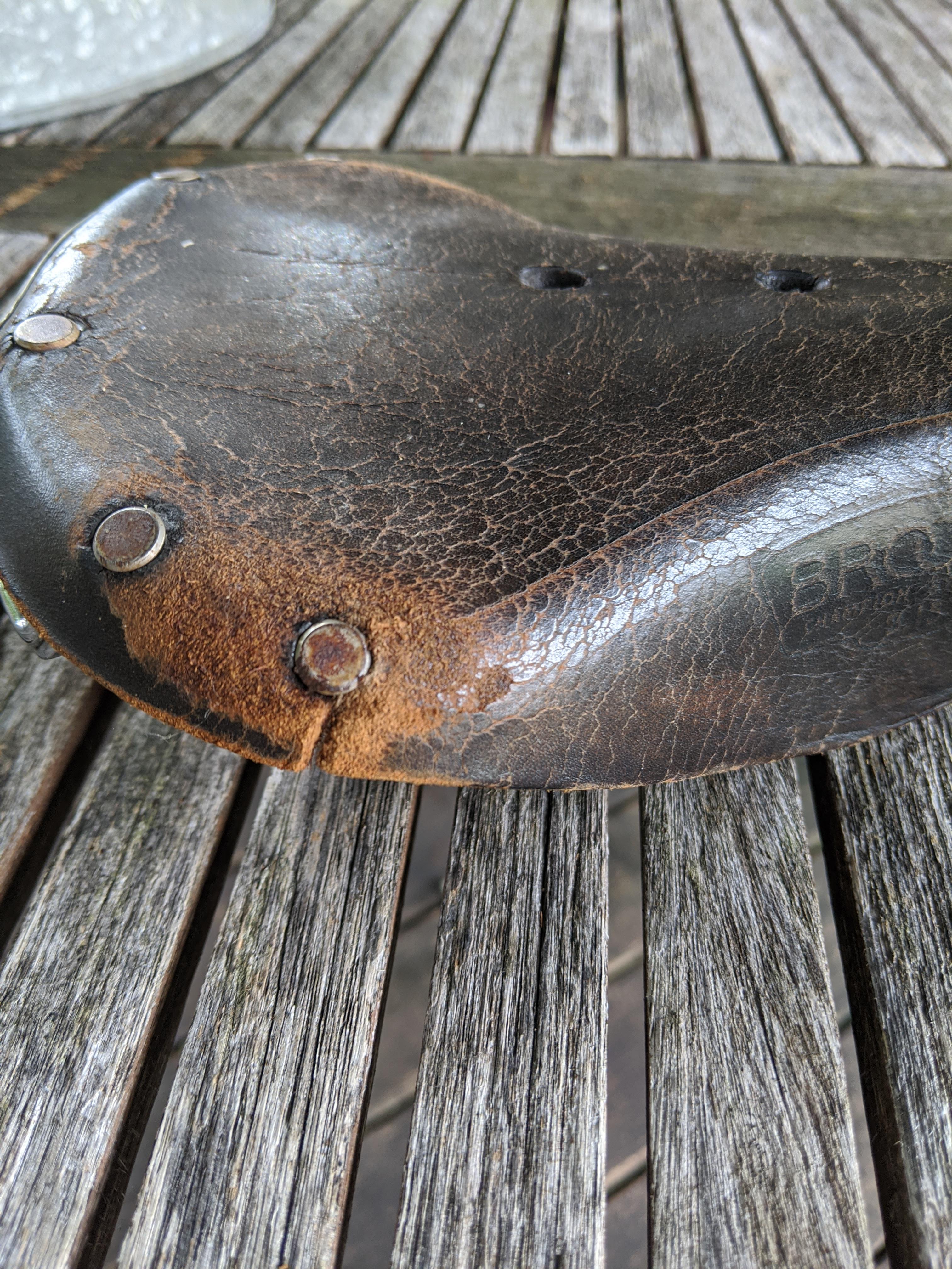 How do prevent this tear in a leather bike seat from getting any worse