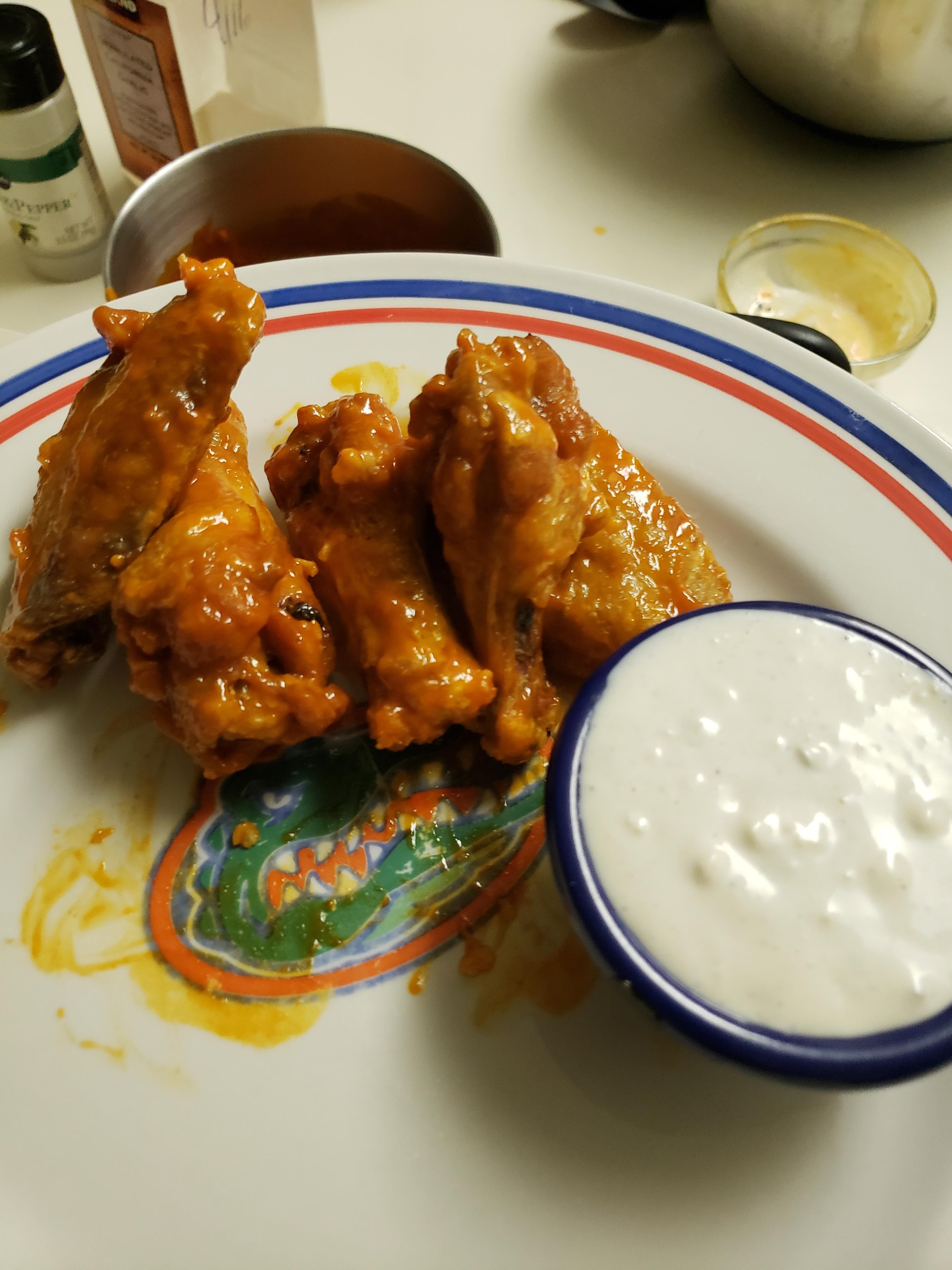 Homemade Blue Cheese dressing. Homemade wing sauce. Go Gators!! r