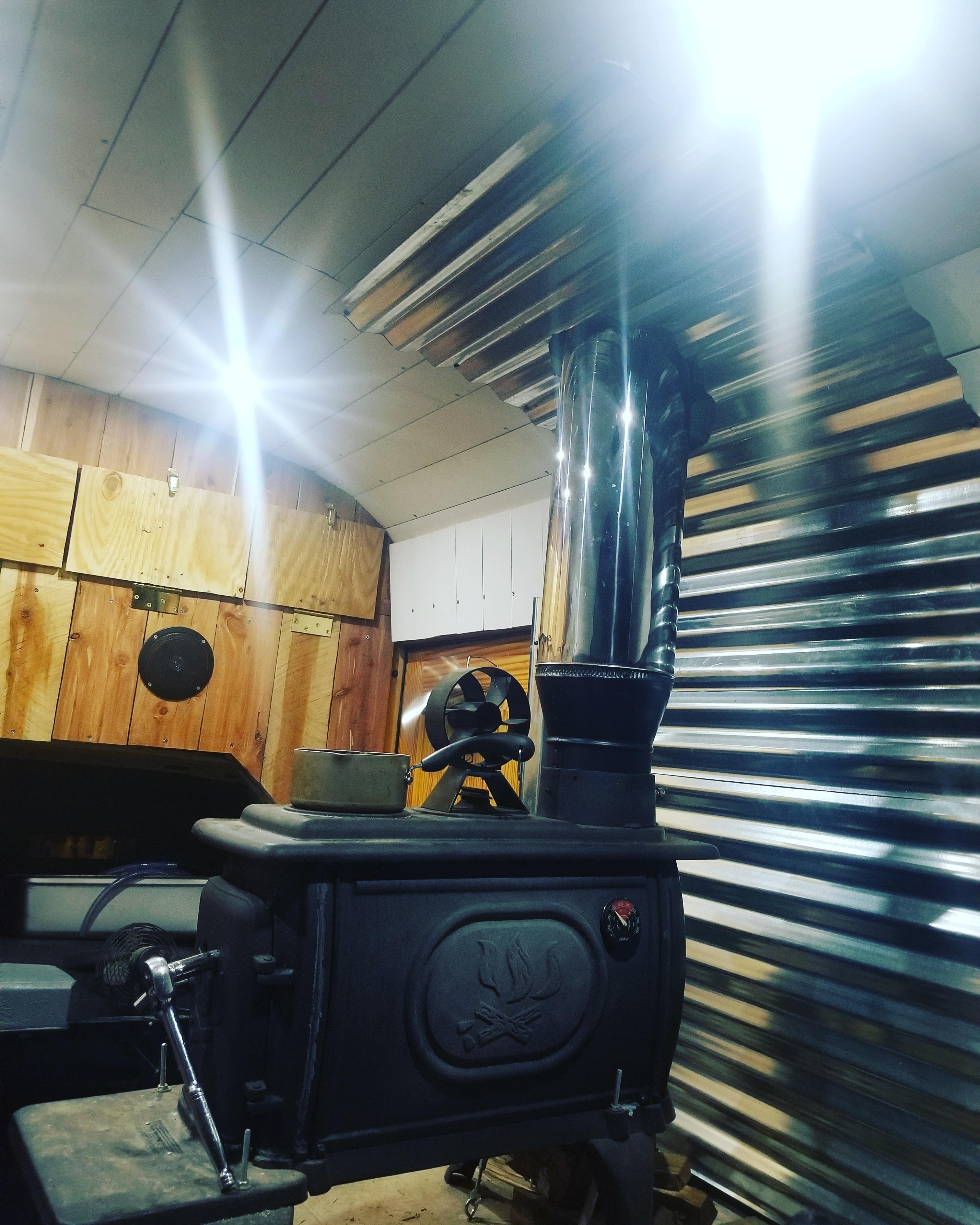 Stove therm gets to over 500f, yet water wont get to a rolling boil. Why might this be? r