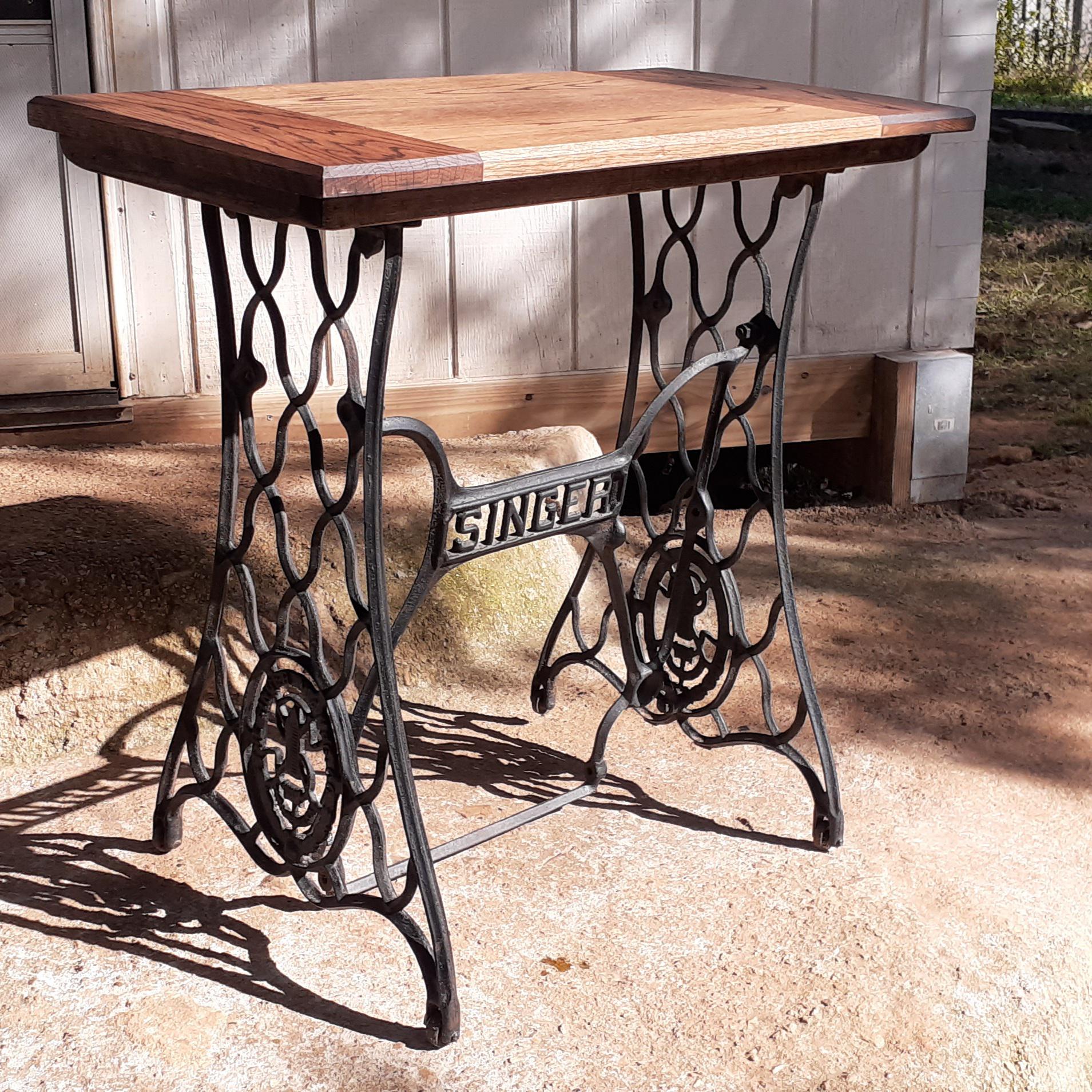 Table with antique sewing machine base, J Kaleb Killian, cast iron and