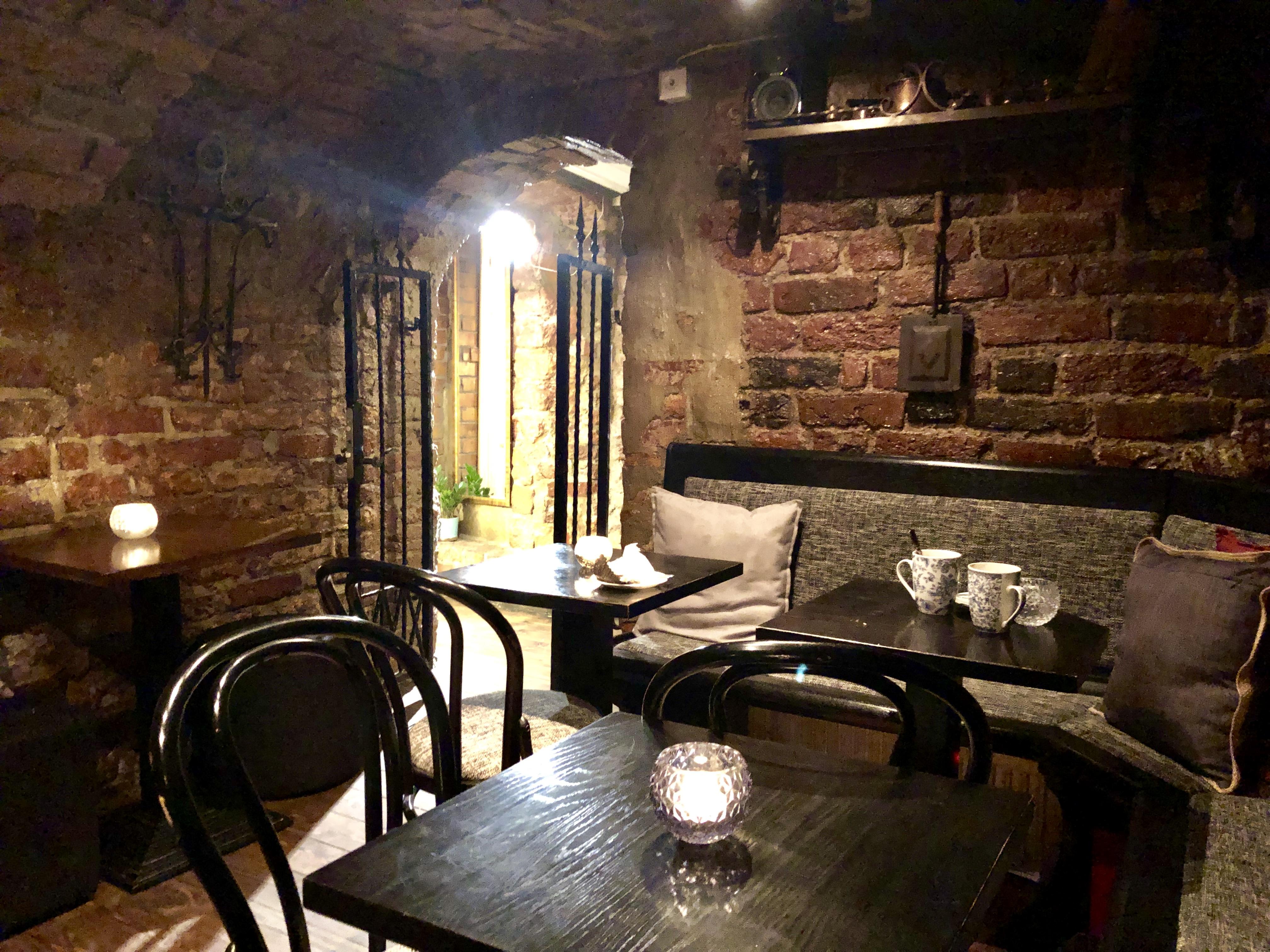 Cellar cafe/bar in Gamla Stan, Stockholm r/CozyPlaces