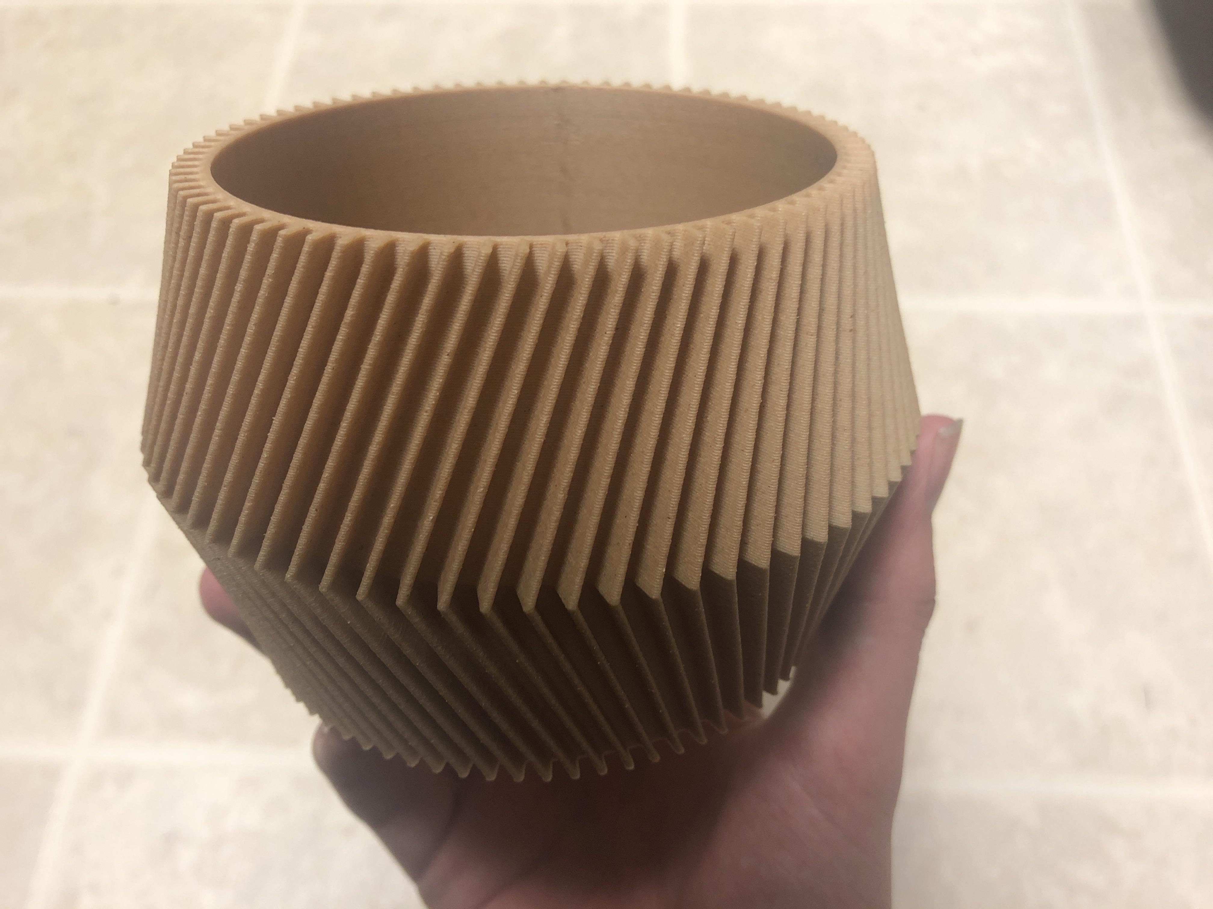 This 3D printed wooden flower pot r/mildlyinteresting