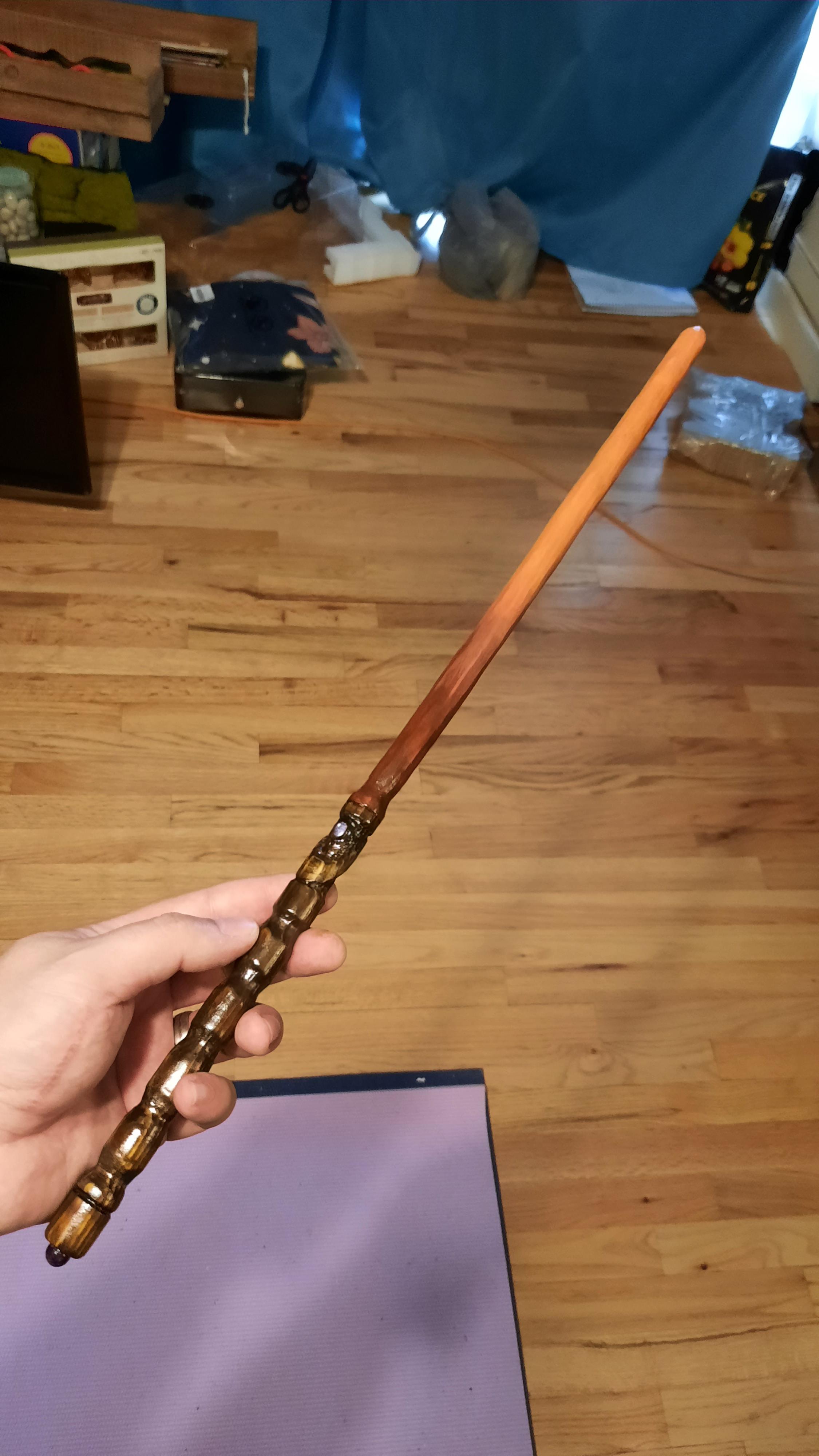 Wand from a poplar dowel, made with a dremel, amethyst bead in handle